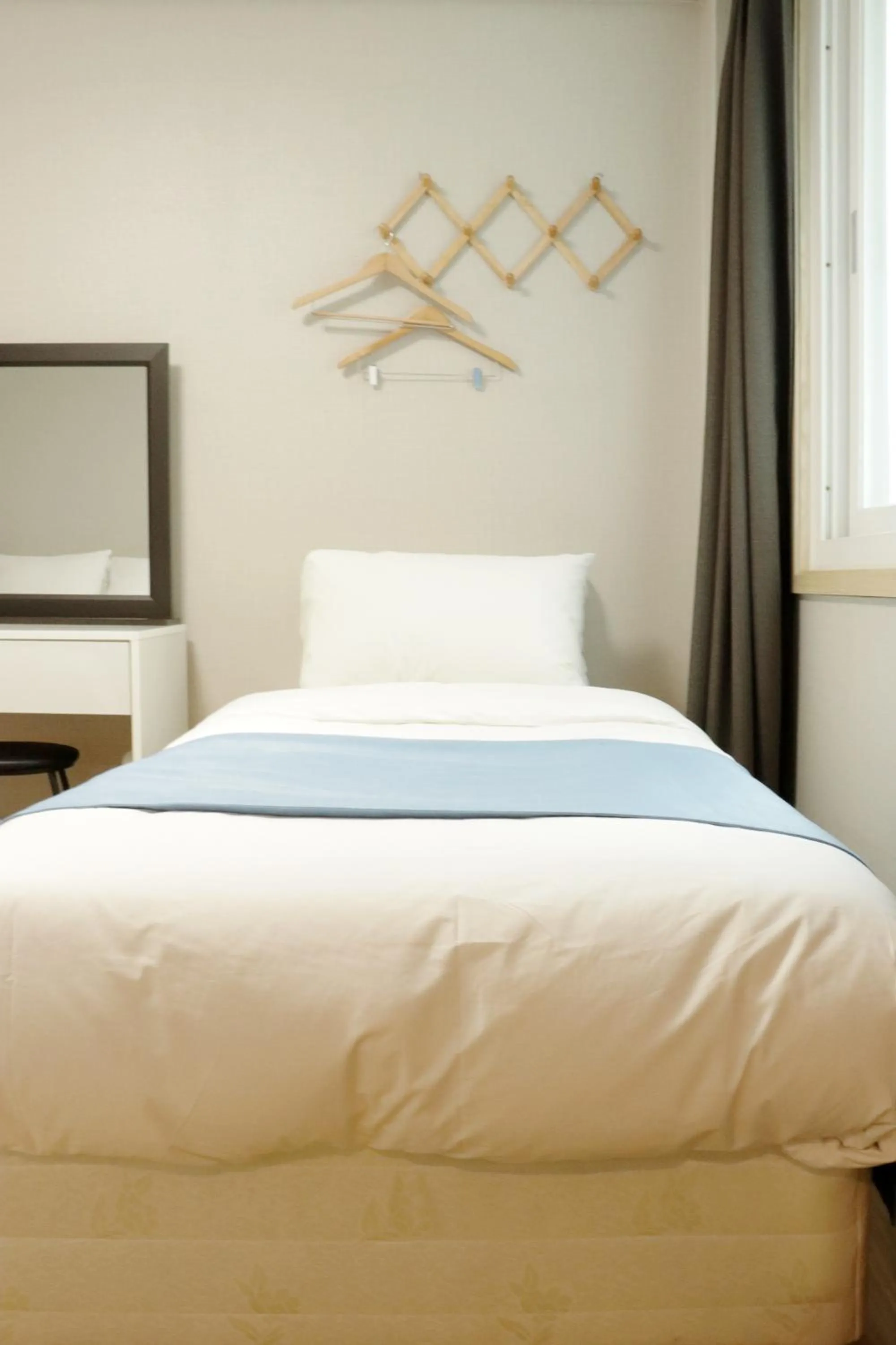 Bed in Ora Stay Hotel