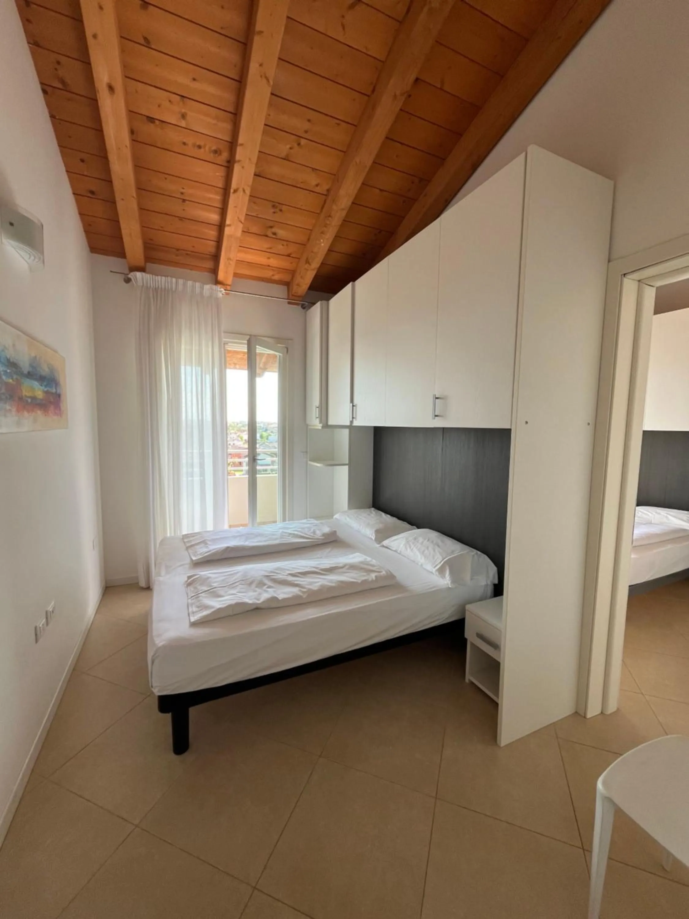 Bed in Villaggio Hemingway - Family Aparthotel