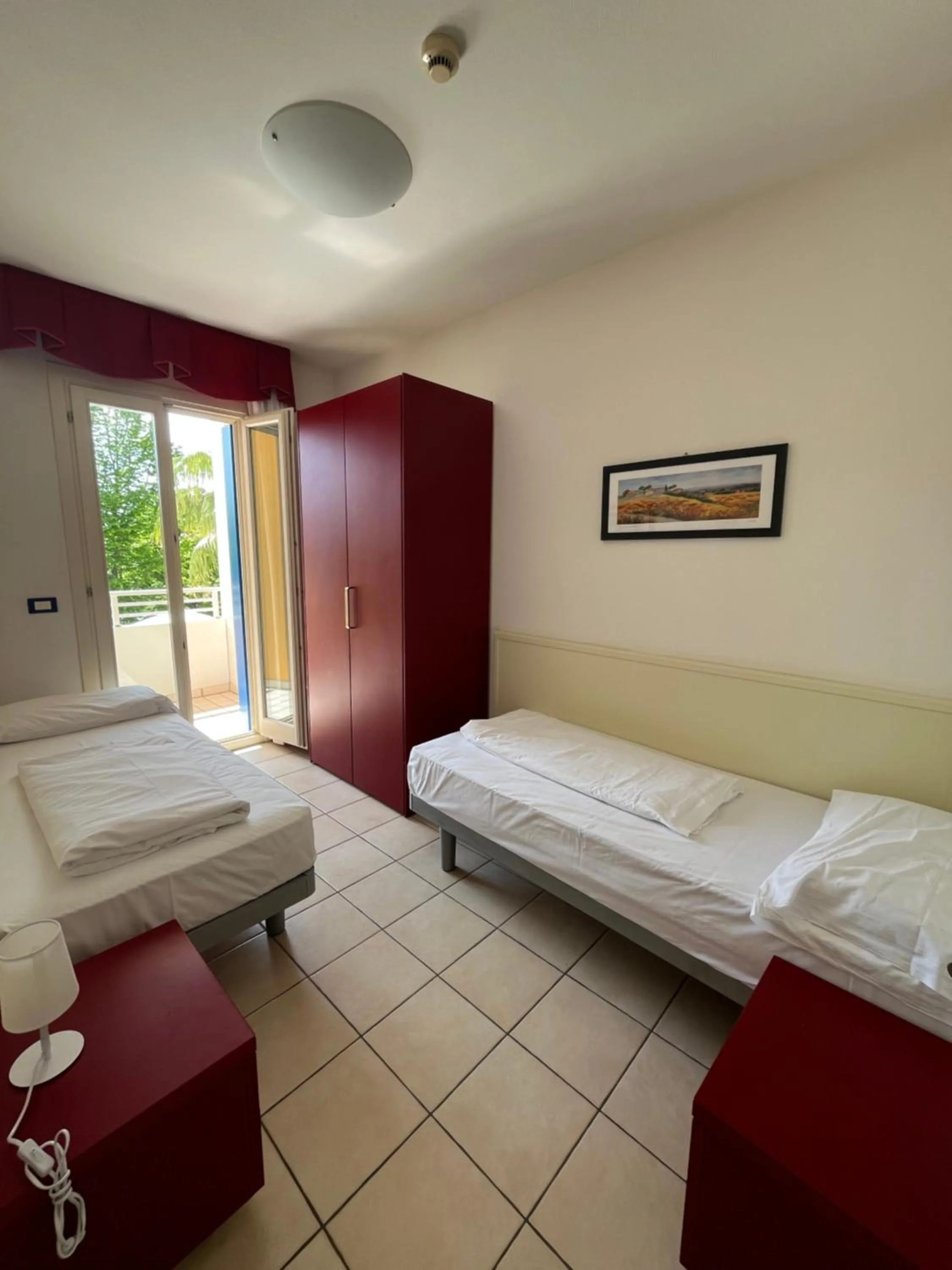 Bed in Villaggio Hemingway - Family Aparthotel