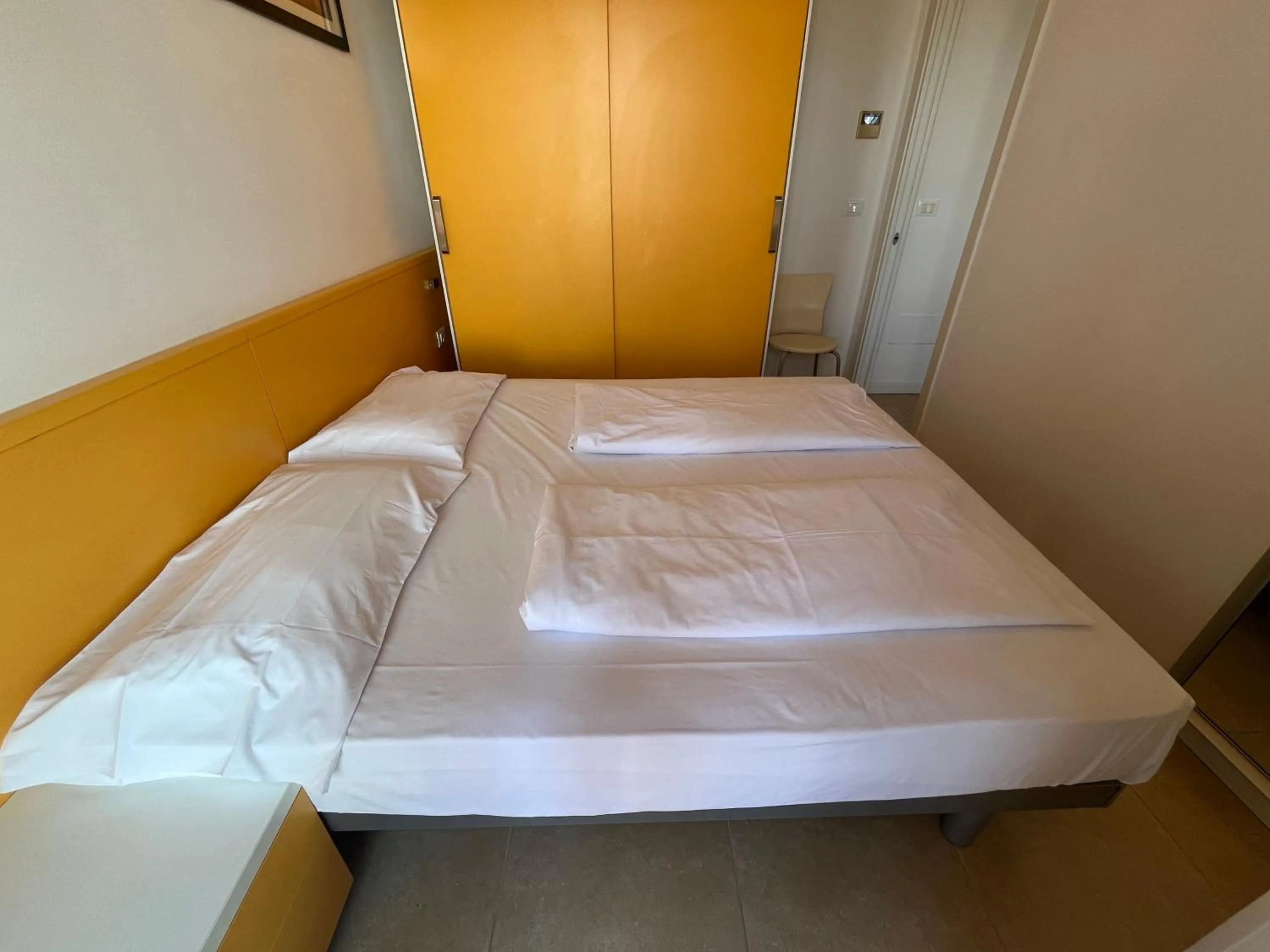 Bed in Villaggio Hemingway - Family Aparthotel