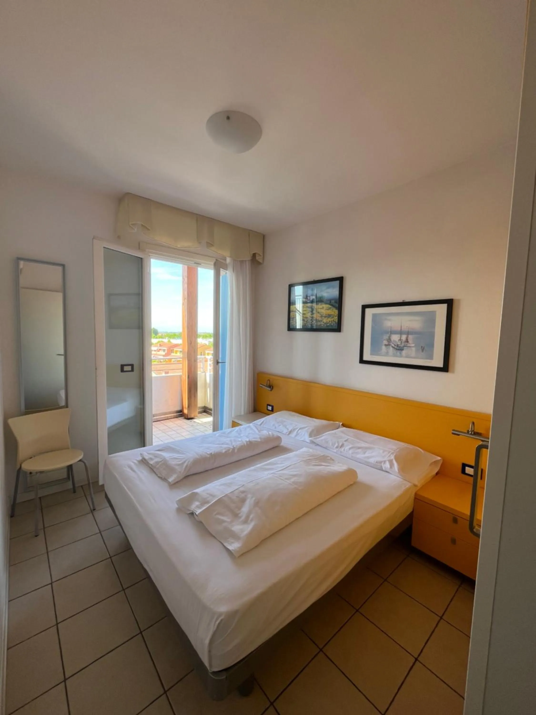 Bed in Villaggio Hemingway - Family Aparthotel