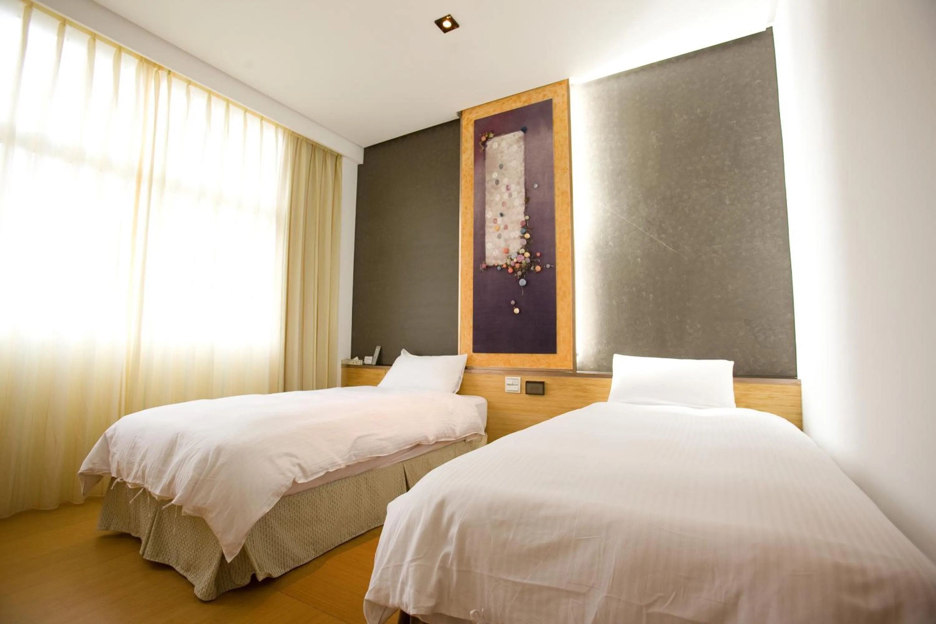 Bed in Zhi Da Craft Service Guest House
