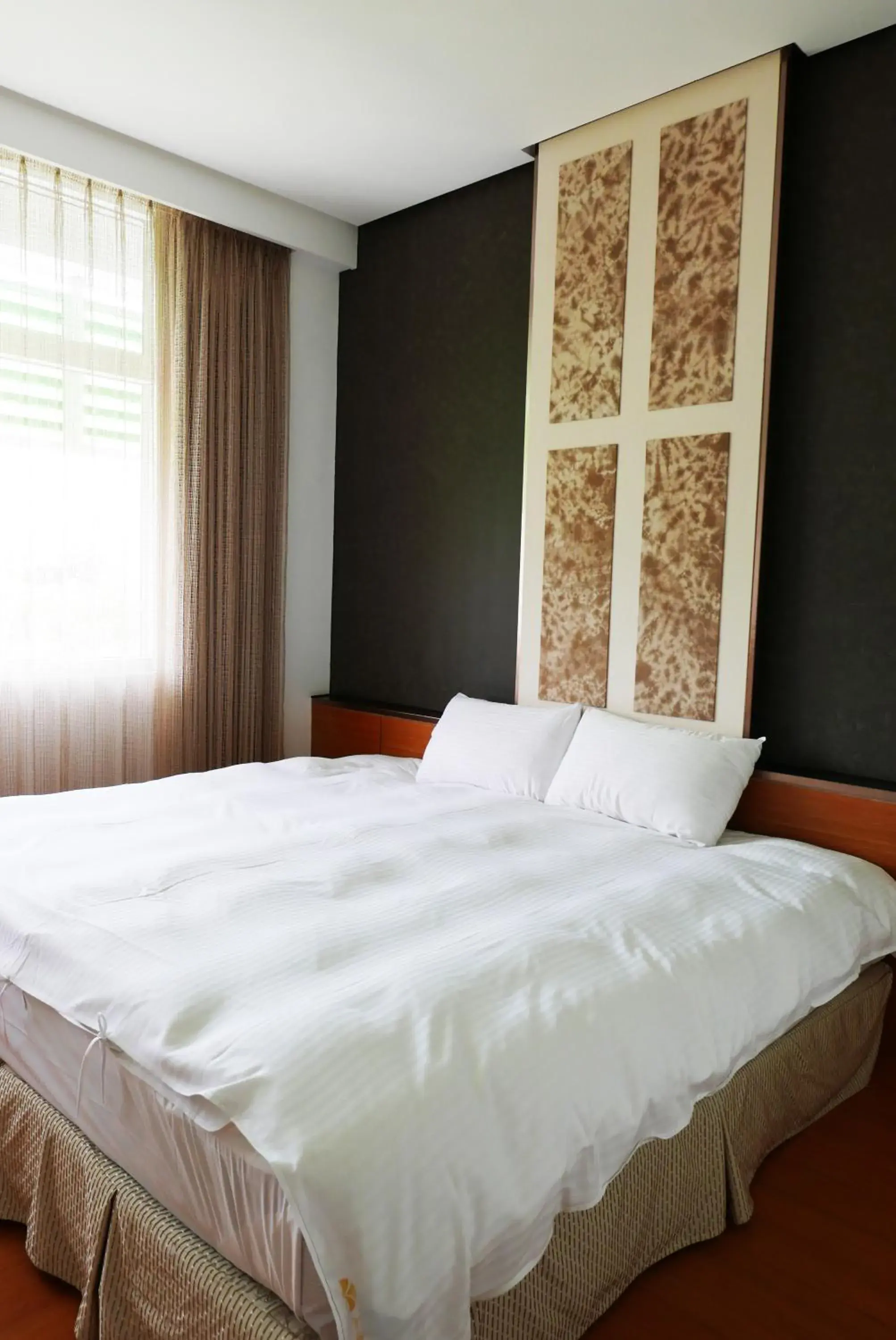 Bed in Zhi Da Craft Service Guest House Bed in Zhi Da Craft Service Guest House