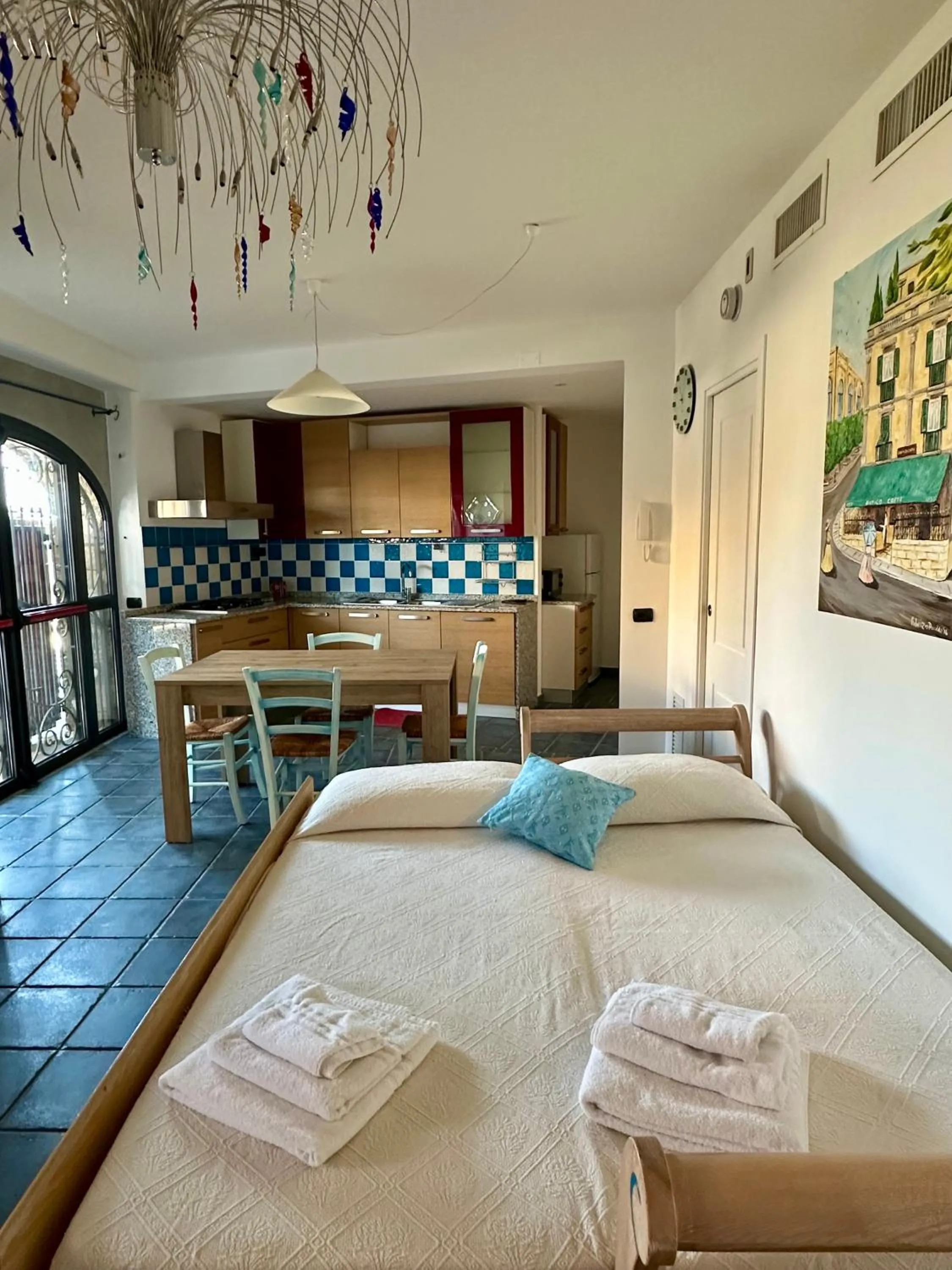 Living room, Bed in Residenza Petrera