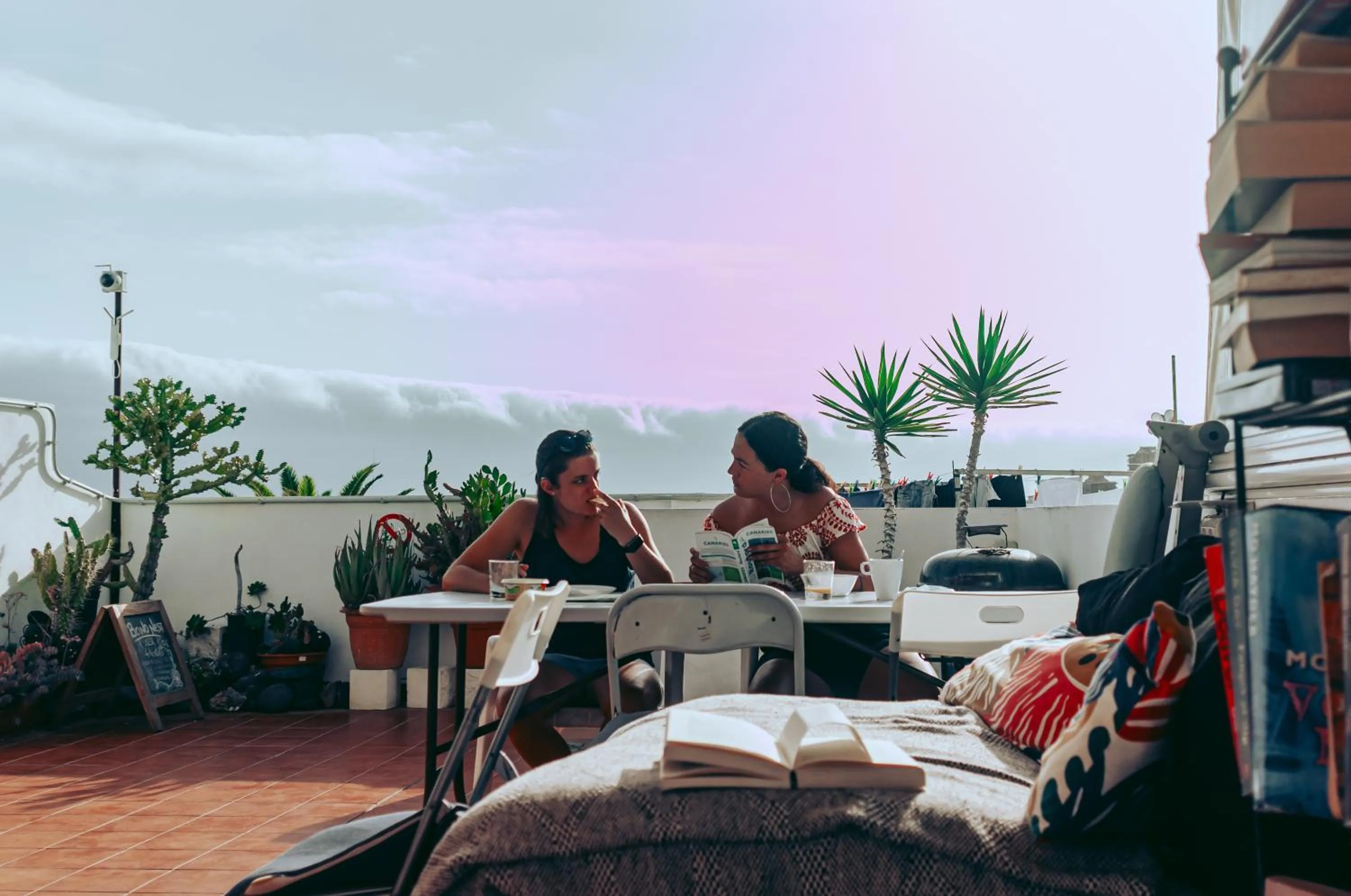 Communal lounge/ TV room in Puerto Nest Hostel