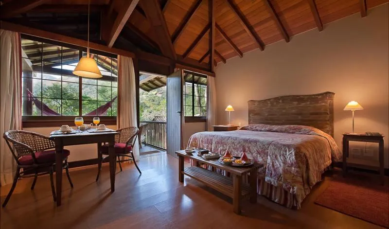 Bed in Pousada Les Roches