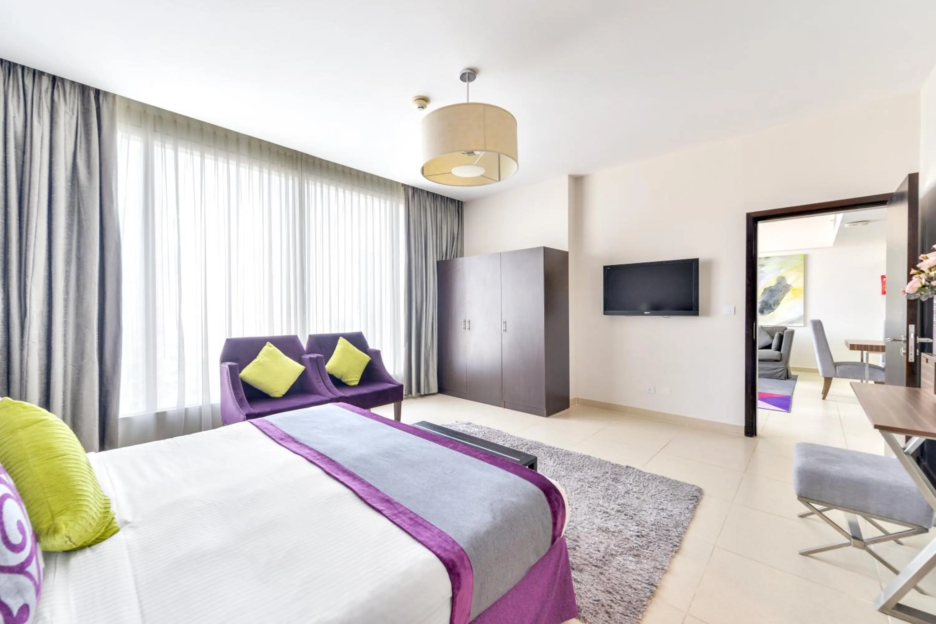 Bed in Nassima Tower Hotel Apartments