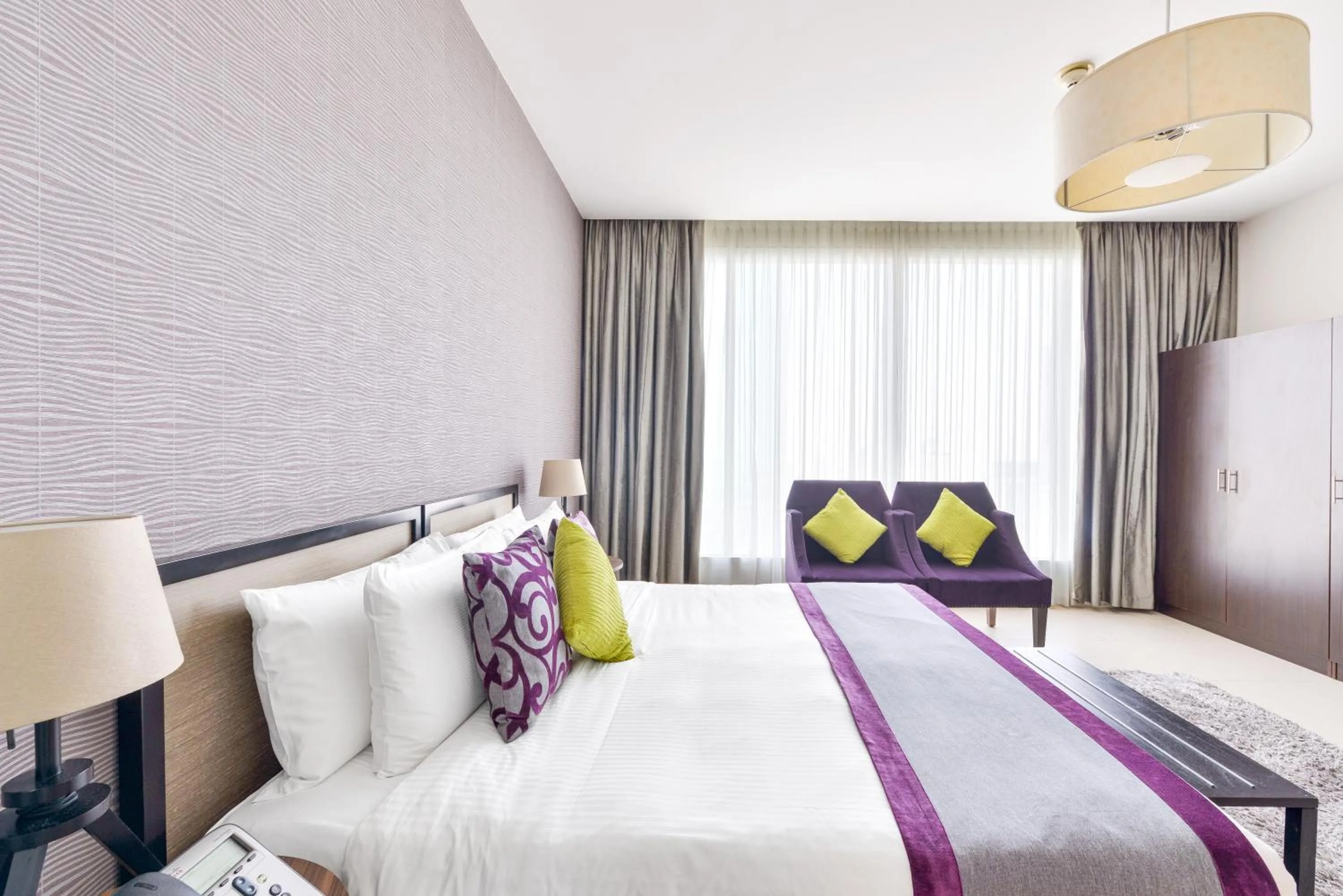 Bed in Nassima Tower Hotel Apartments