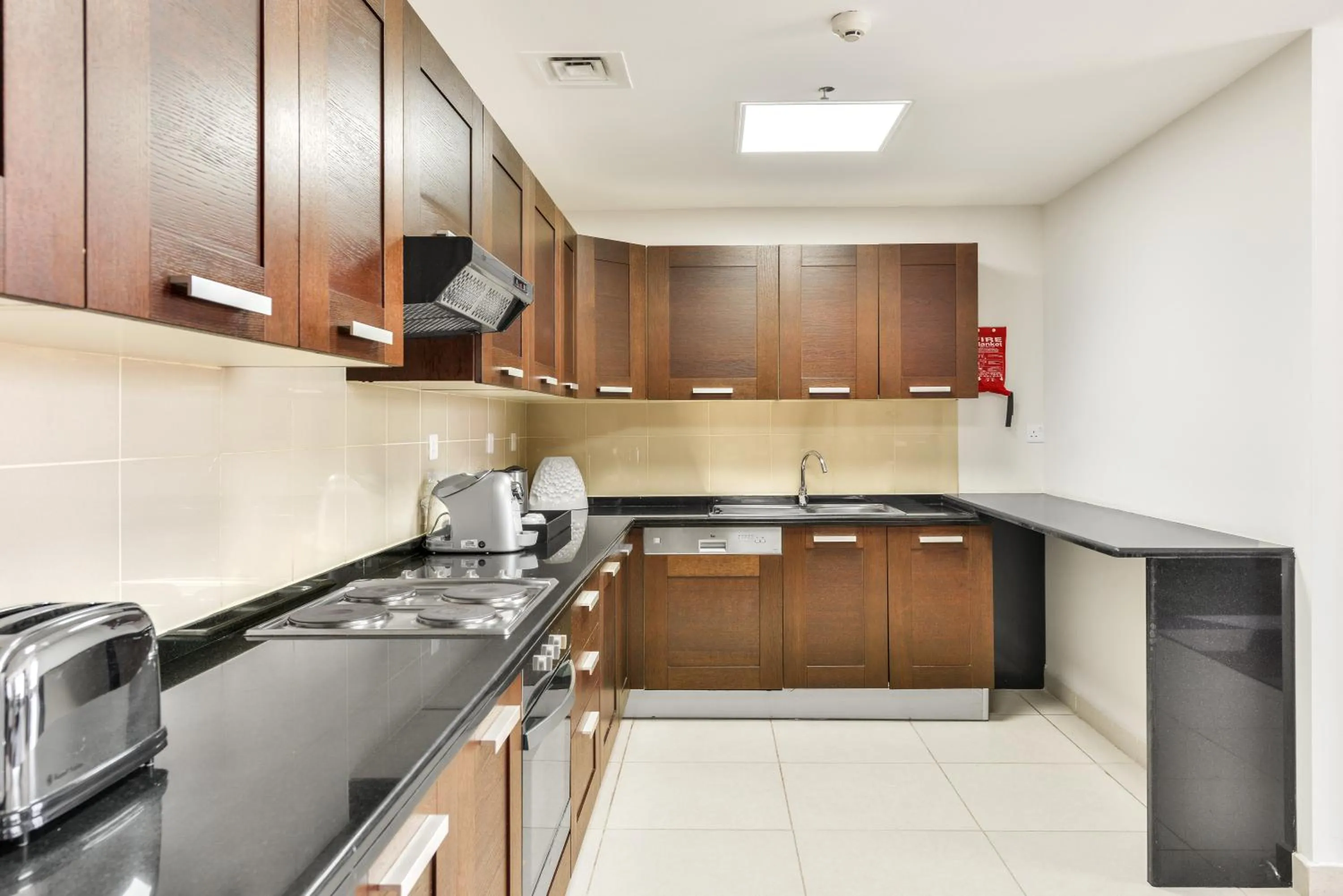 Kitchen or kitchenette in Nassima Tower Hotel Apartments