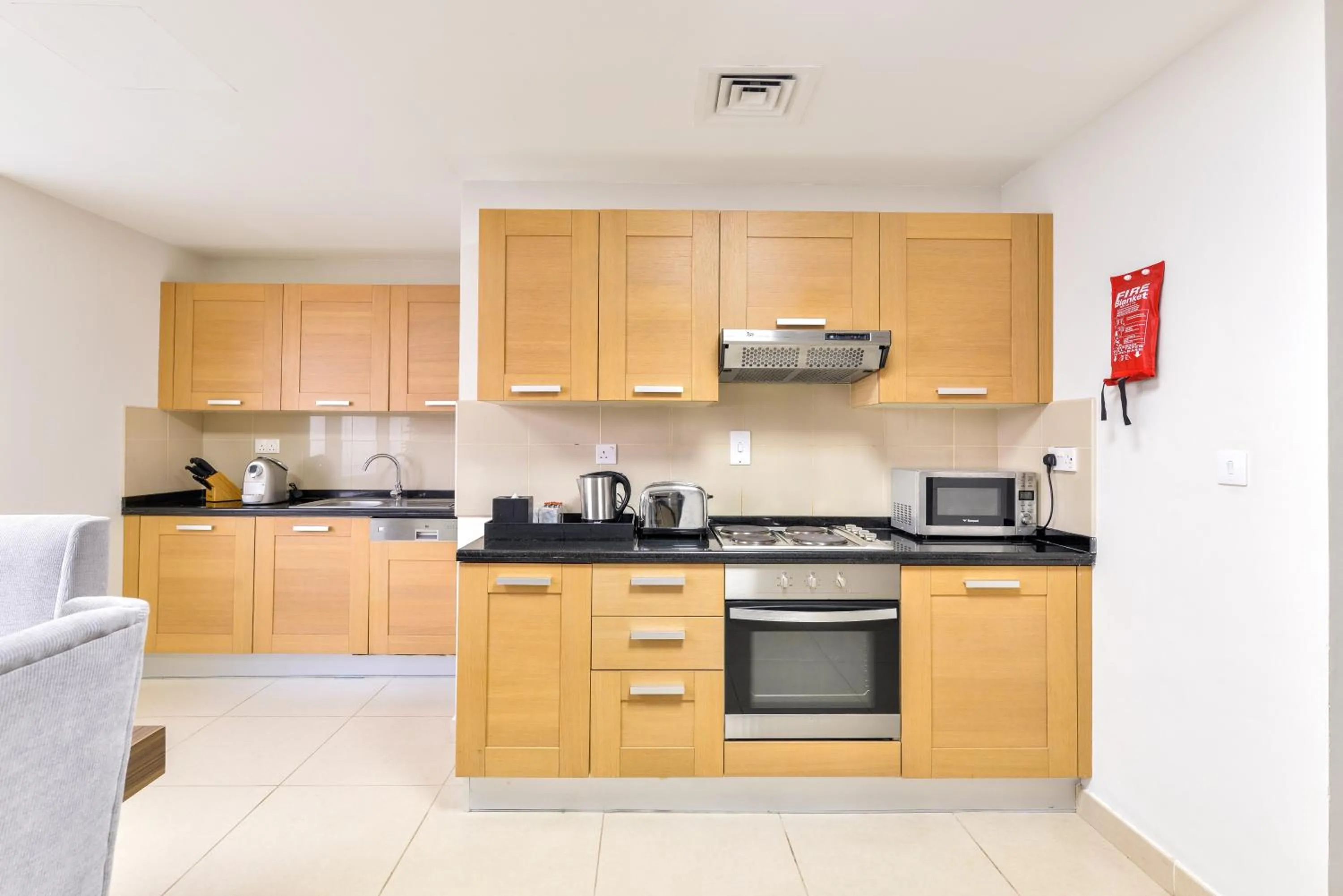 Kitchen or kitchenette in Nassima Tower Hotel Apartments