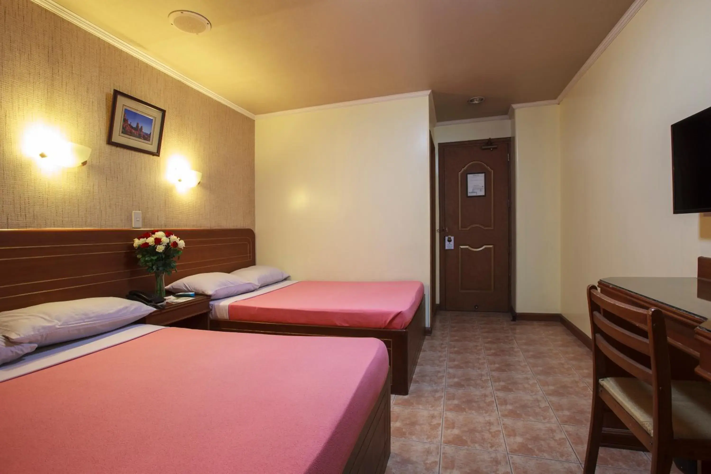 Bed in Paladin Hotel