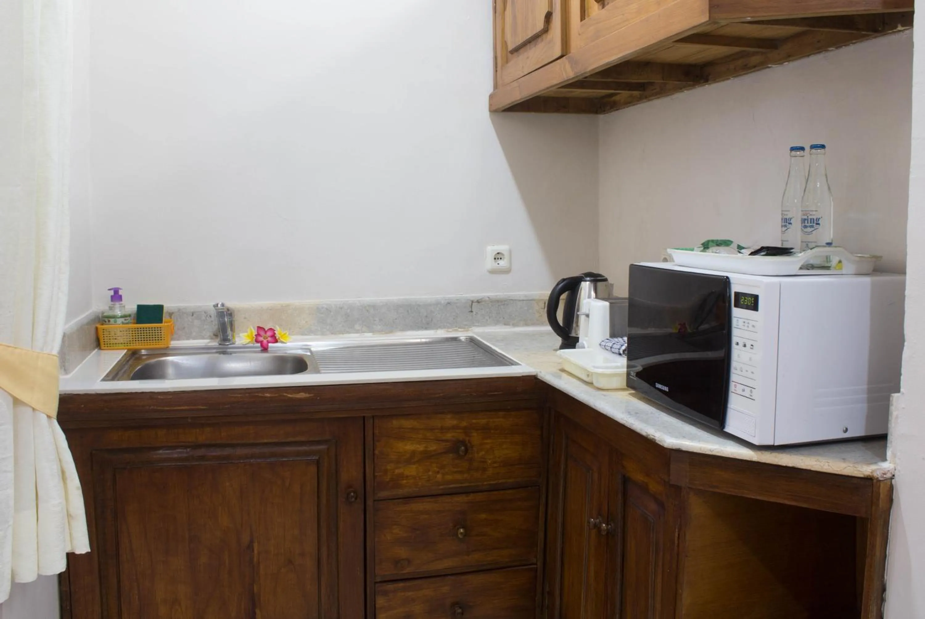 Kitchen or kitchenette in Bali Seascape Beach Club