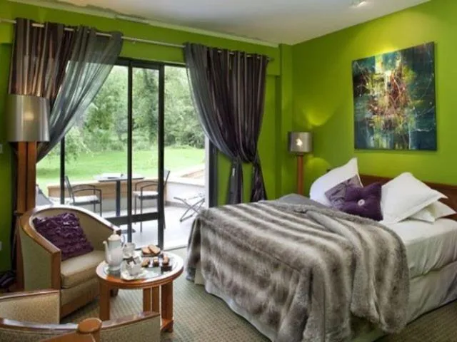 Photo of the whole room, Bed in Logis La Source Bleue