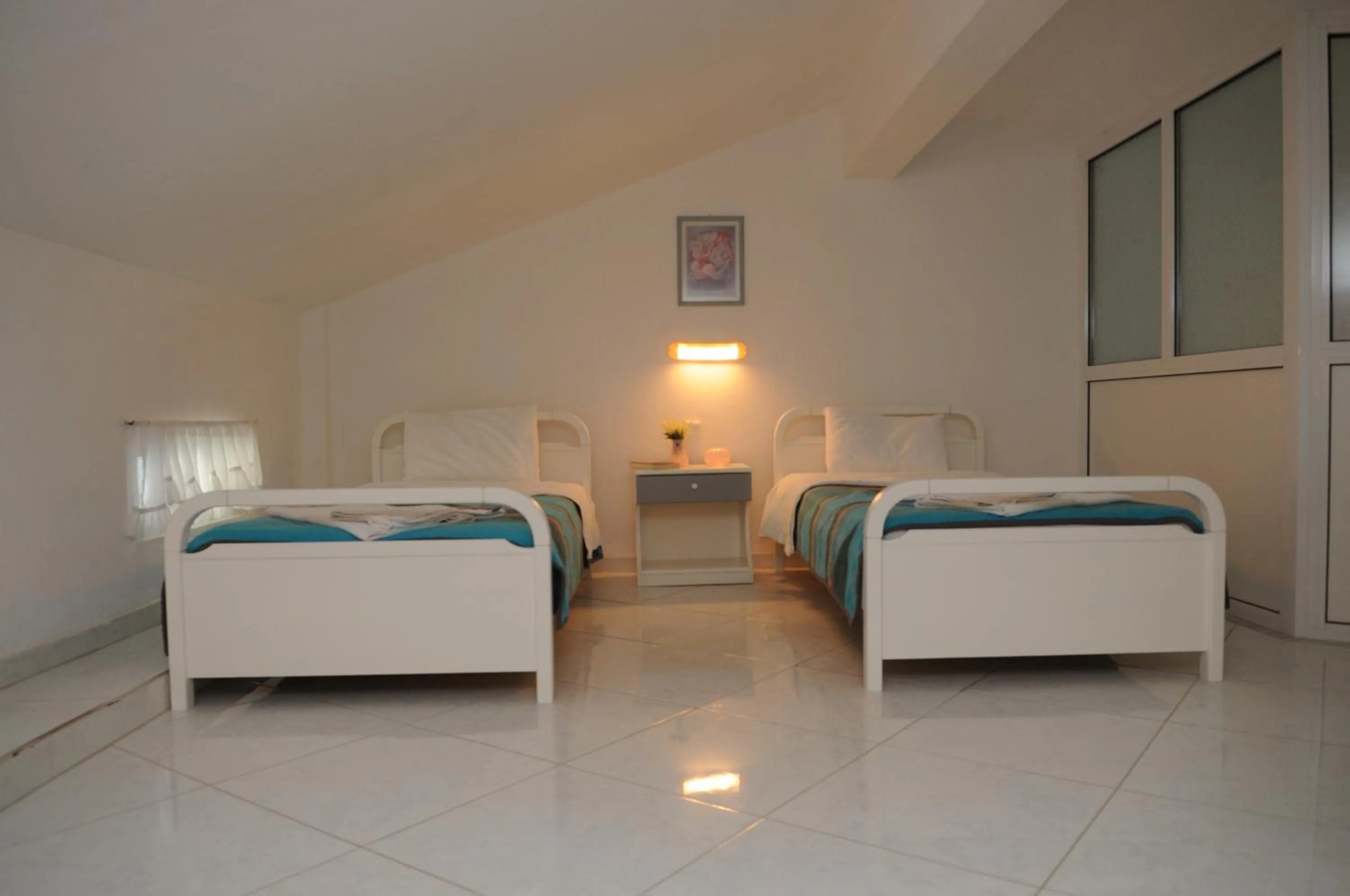Bed in Pegasus Hotel