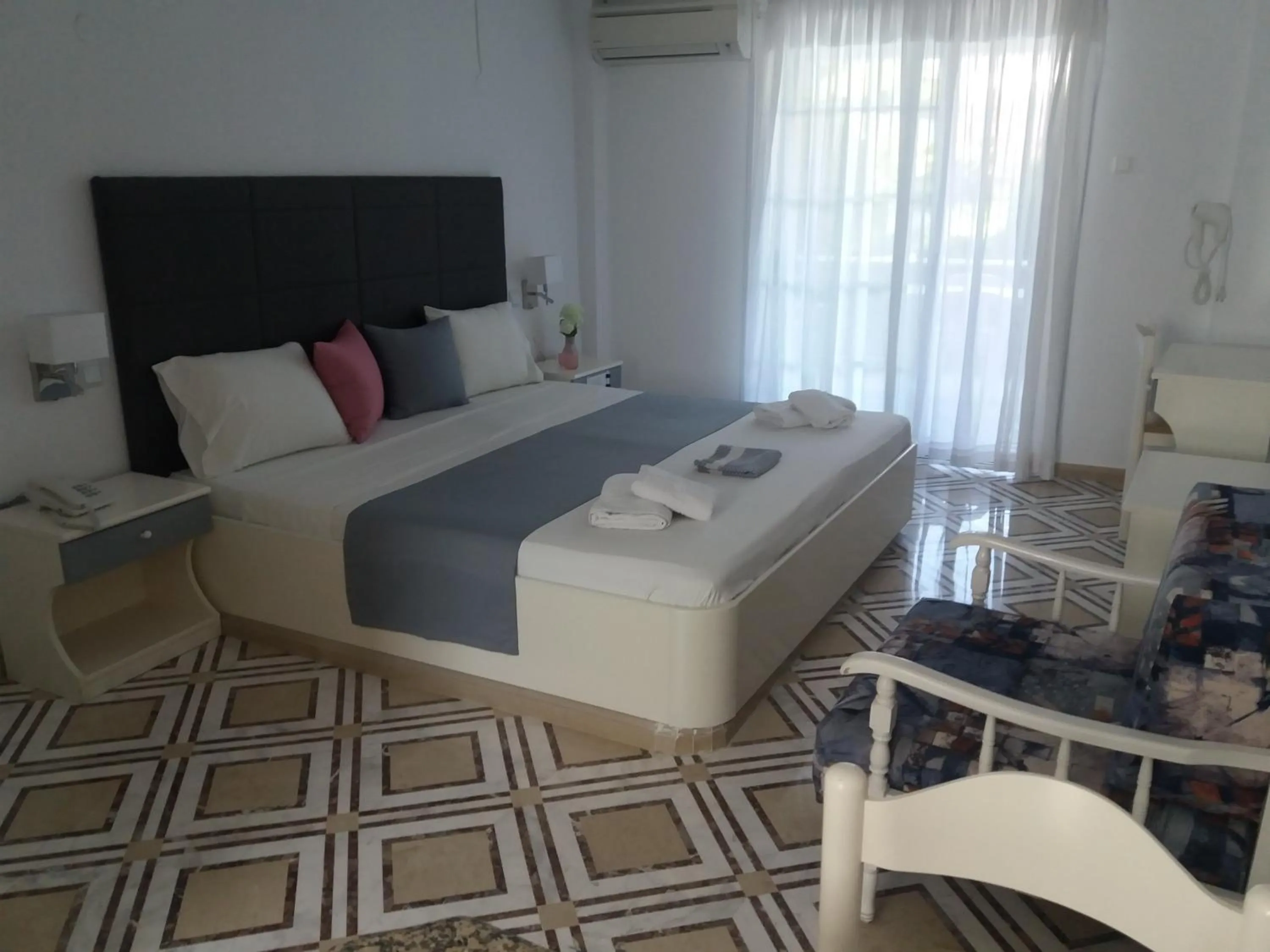 Shower, Bed in Pegasus Hotel
