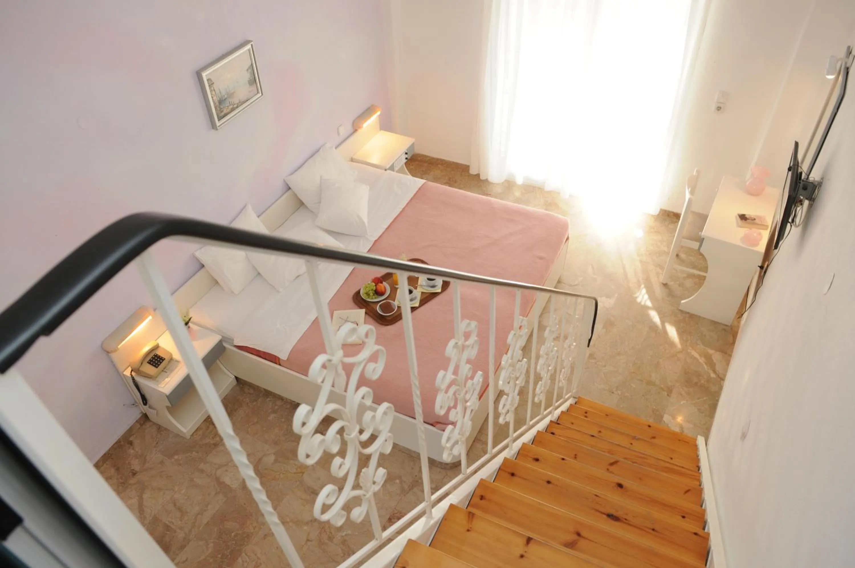 Bed in Pegasus Hotel