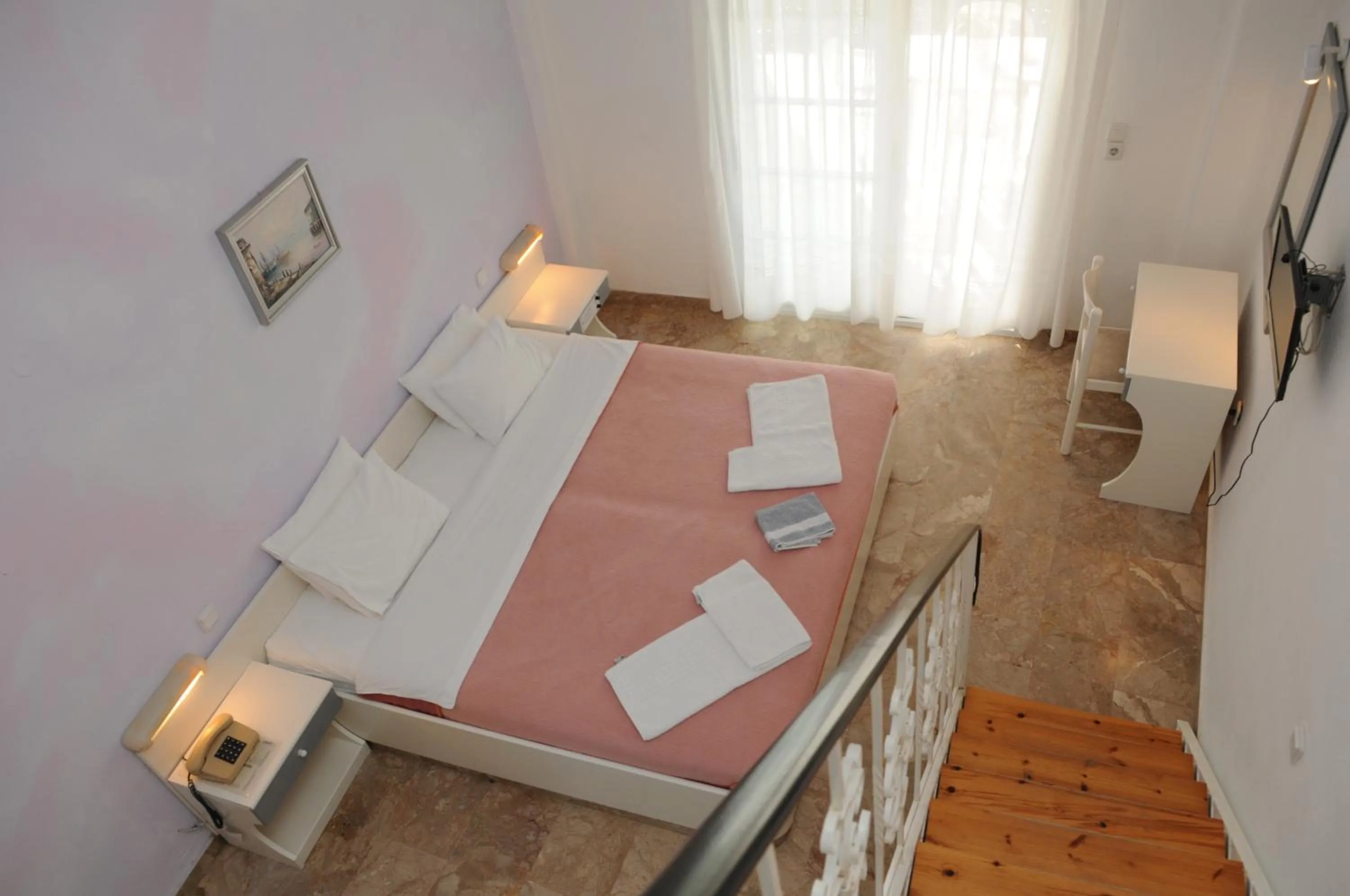 Bed in Pegasus Hotel