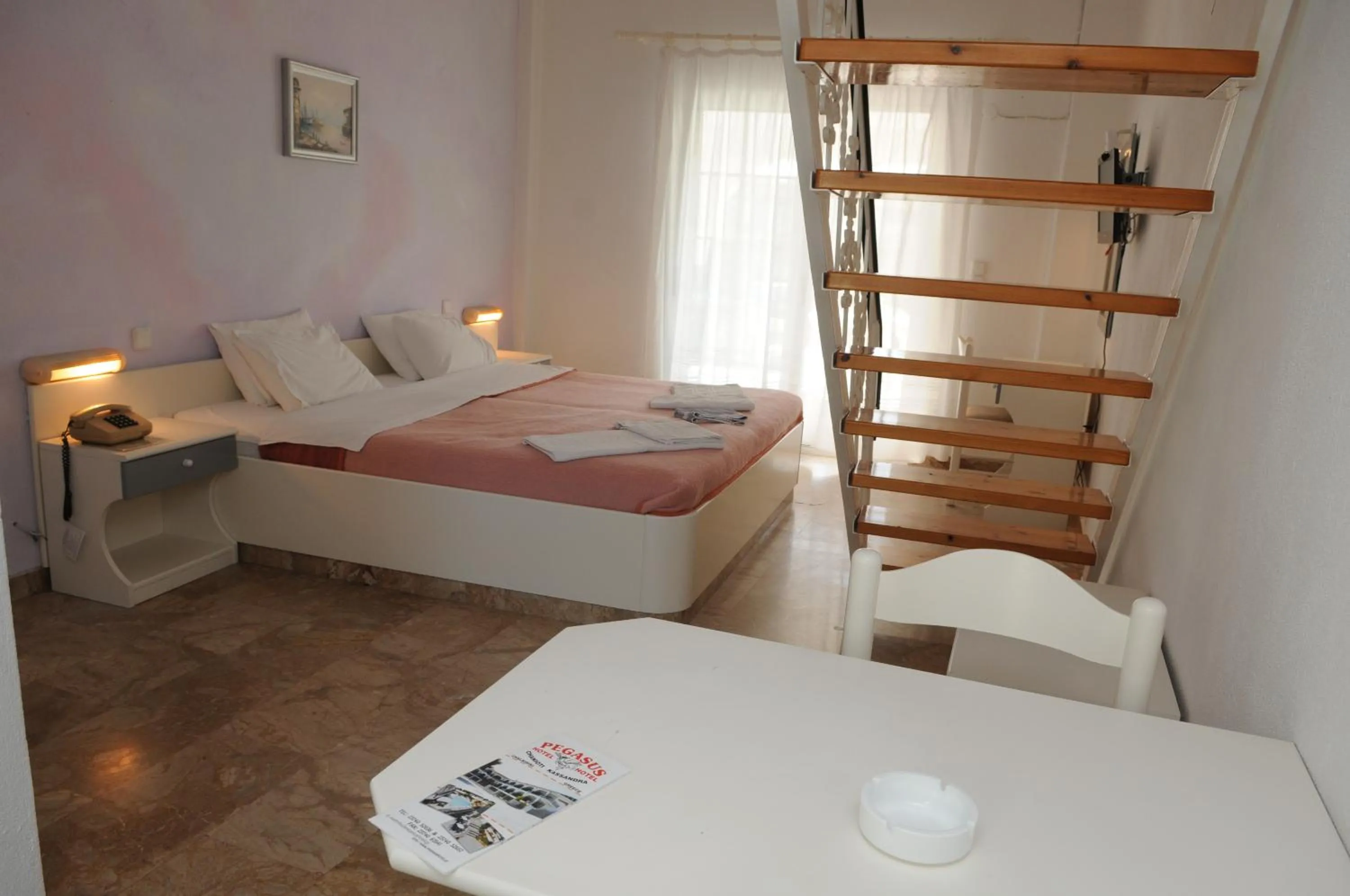 Bed in Pegasus Hotel