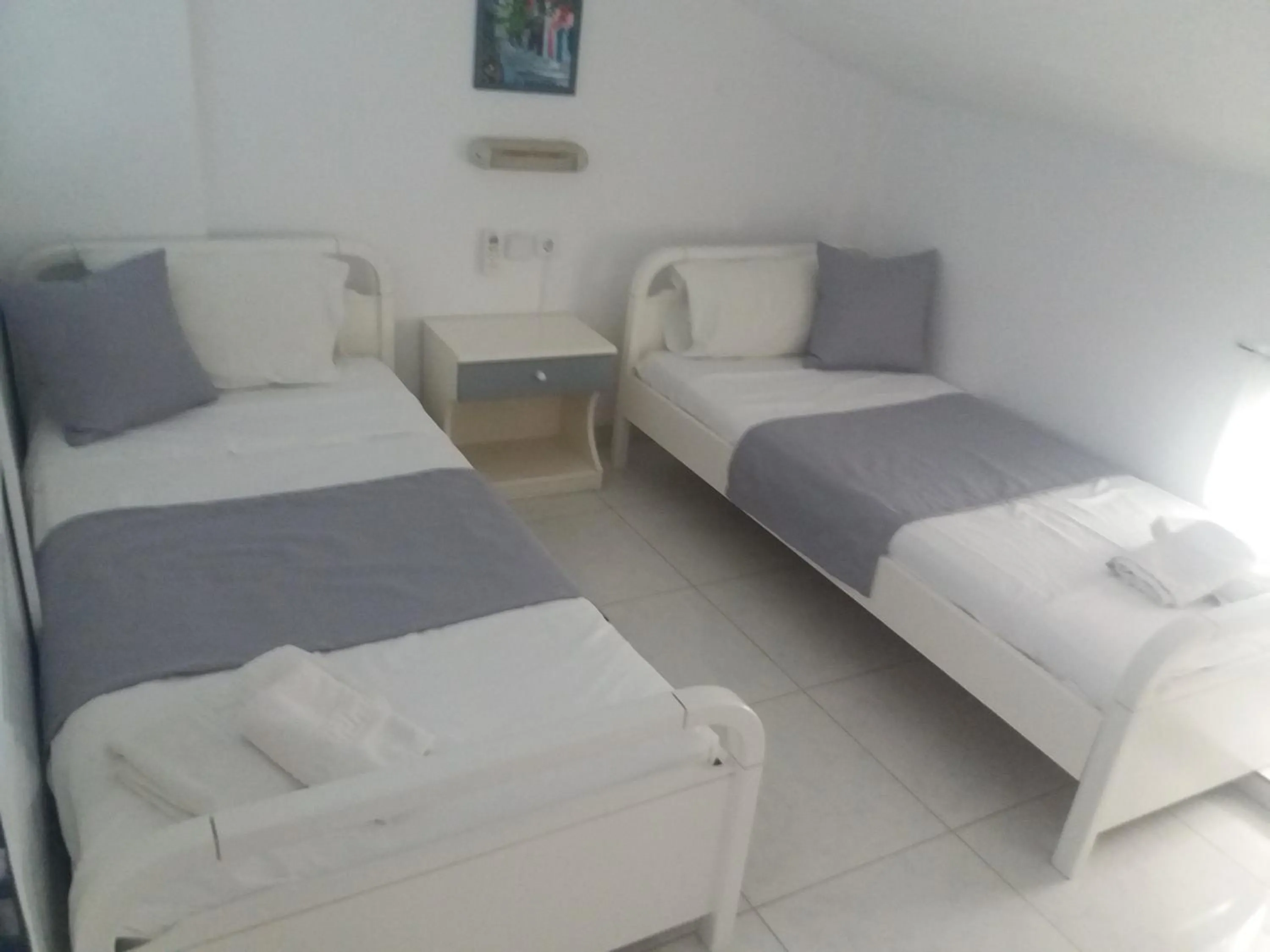 Bed in Pegasus Hotel