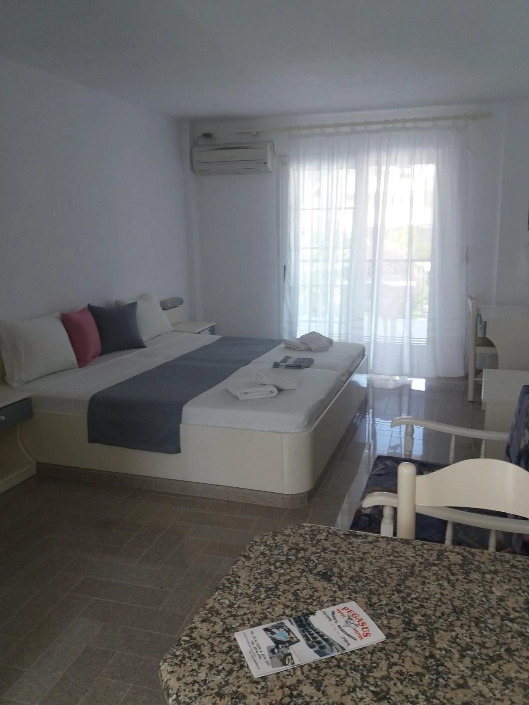 Bed in Pegasus Hotel
