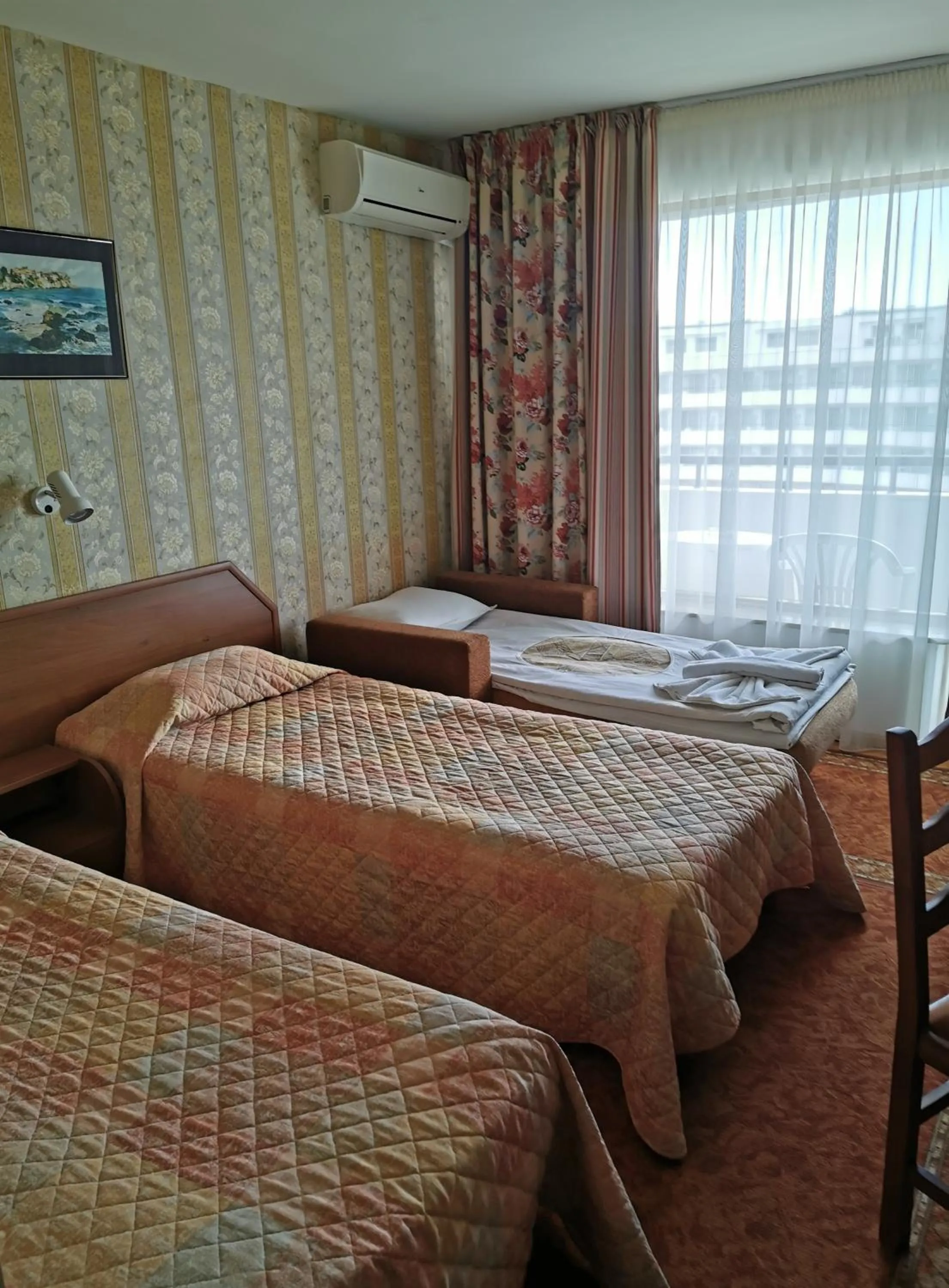 Bed in Hotel Olymp