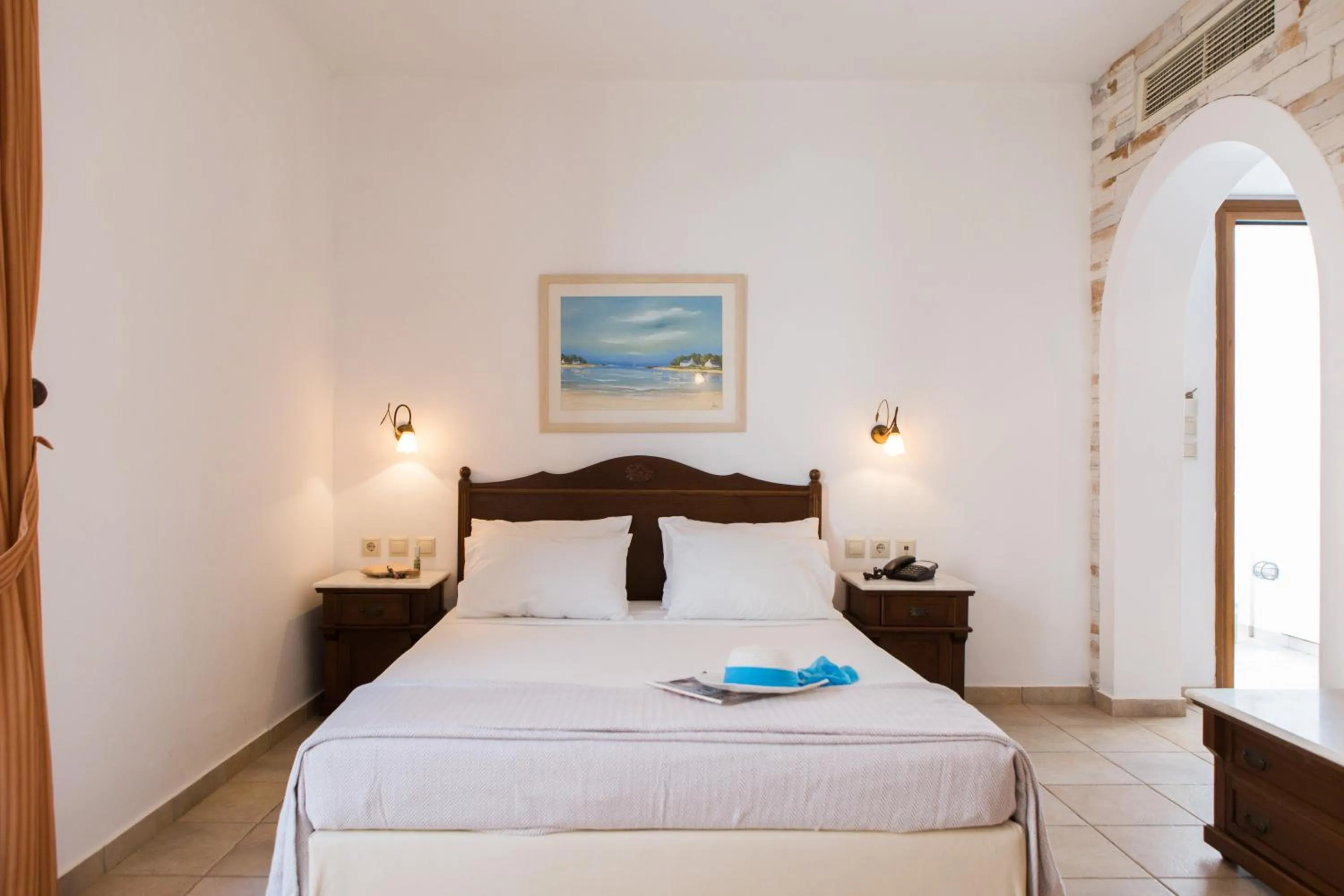 Bed in Plaza Beach Hotel