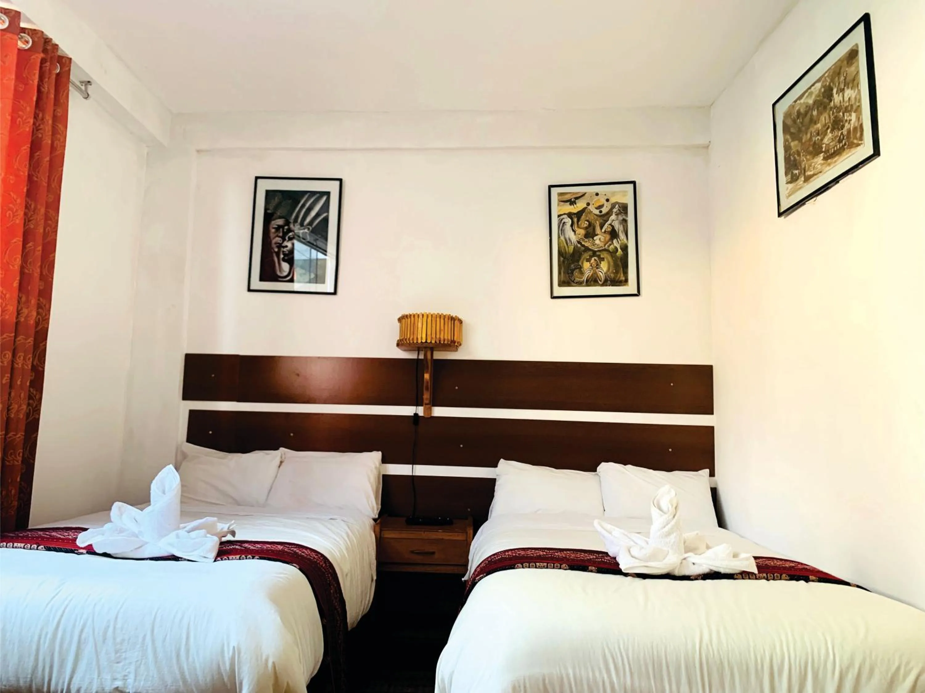 Bed in Inka Khawarina Tambo Lodge