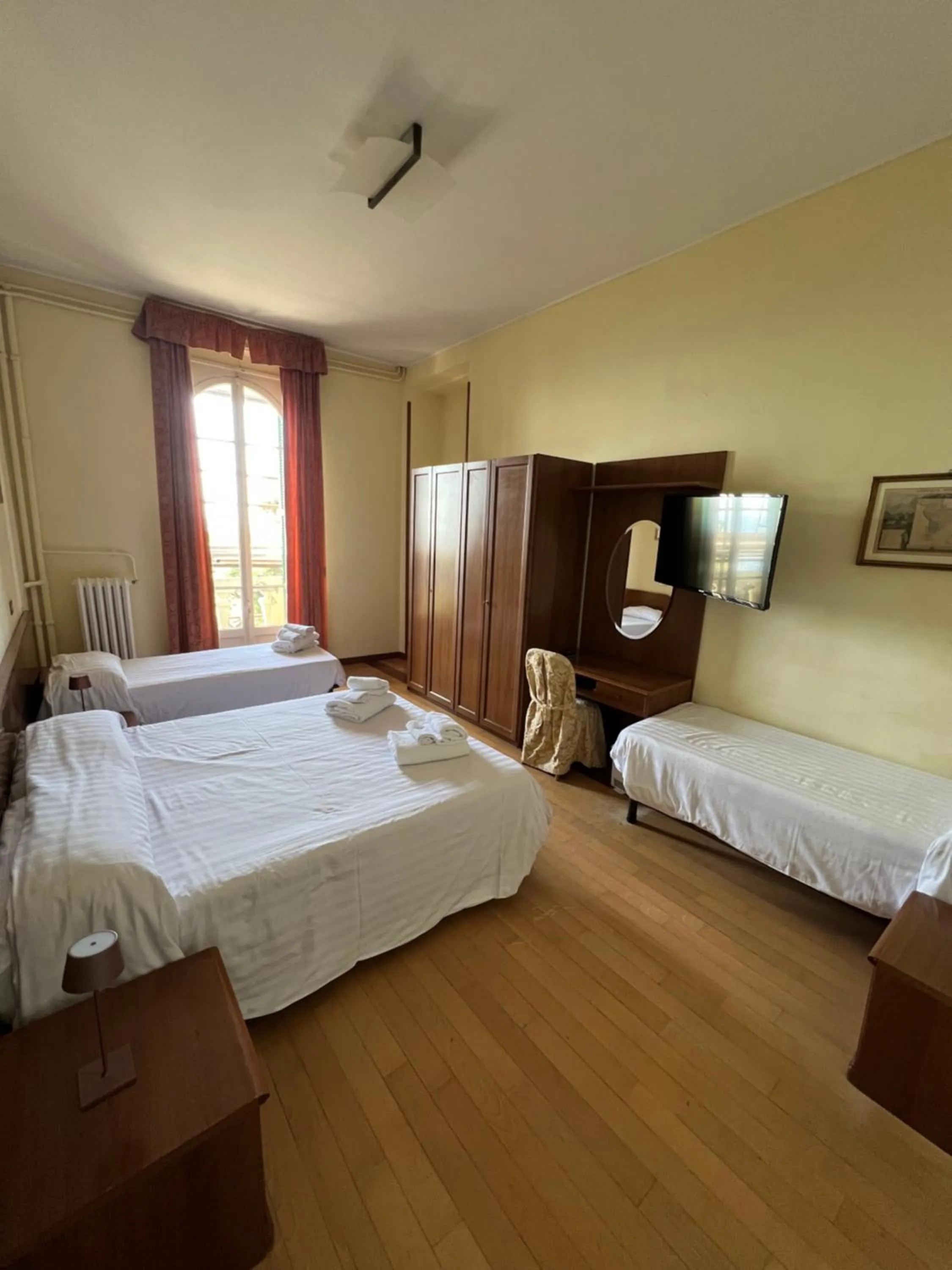 Bed in Hotel Petit Royal