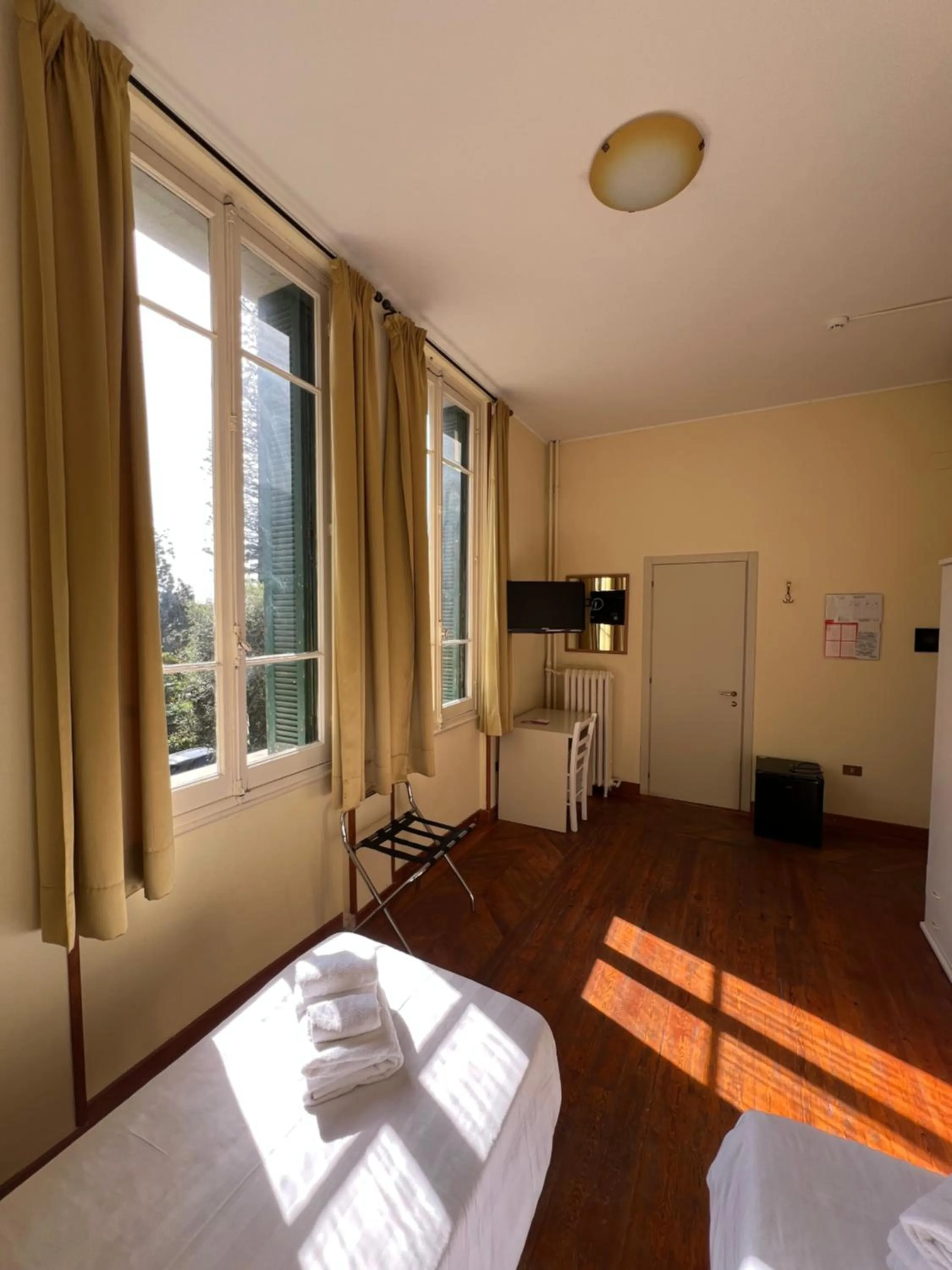 Bed in Hotel Petit Royal