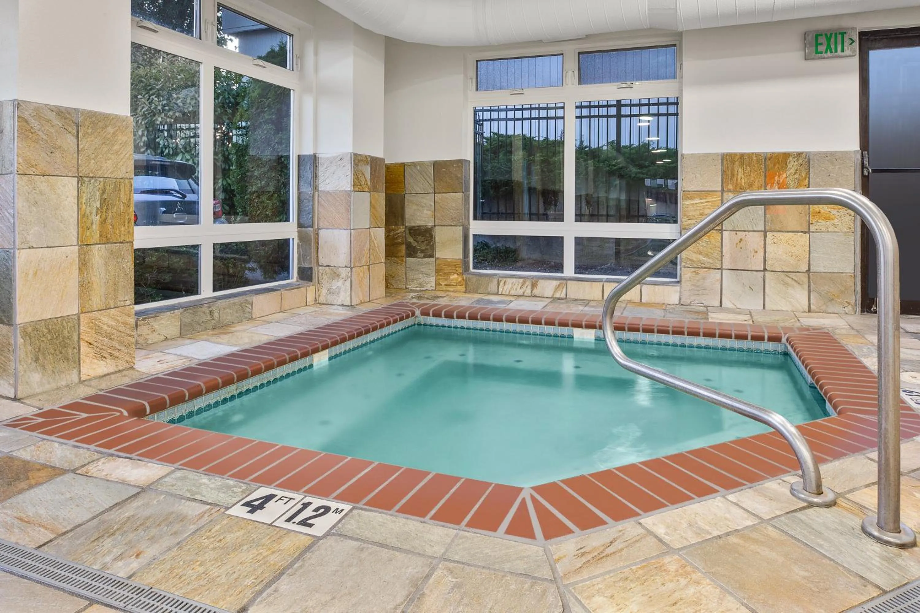 Swimming pool in Holiday Inn Express & Suites Tacoma by IHG