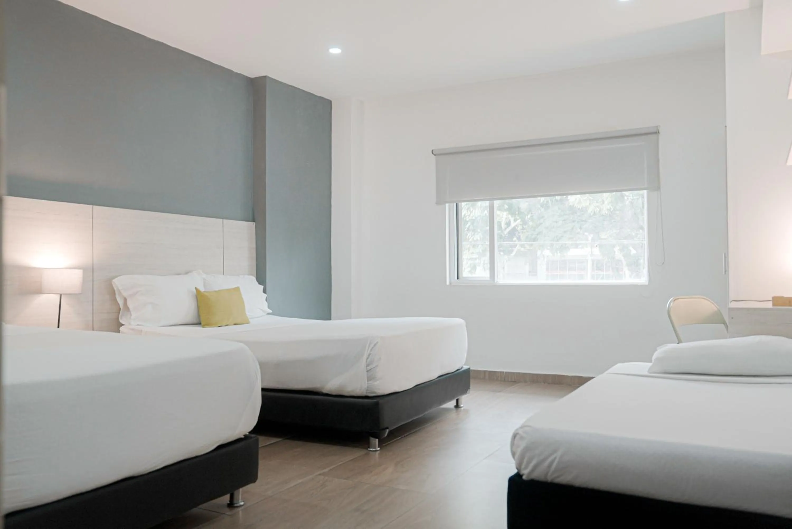 Bed in Basic Hotel Chipichape by Hoteles MS