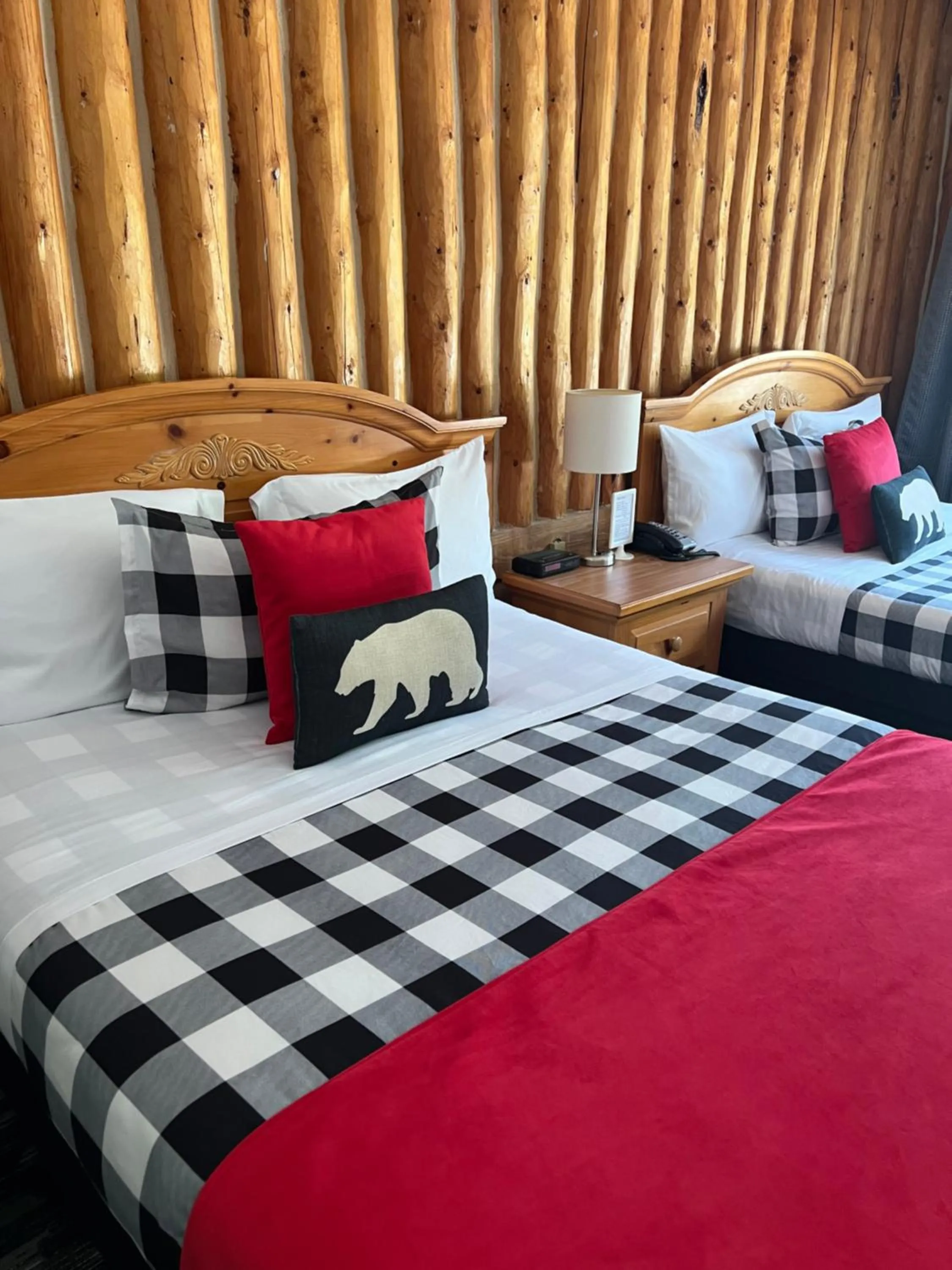 Bed in Mystic Isle Motel