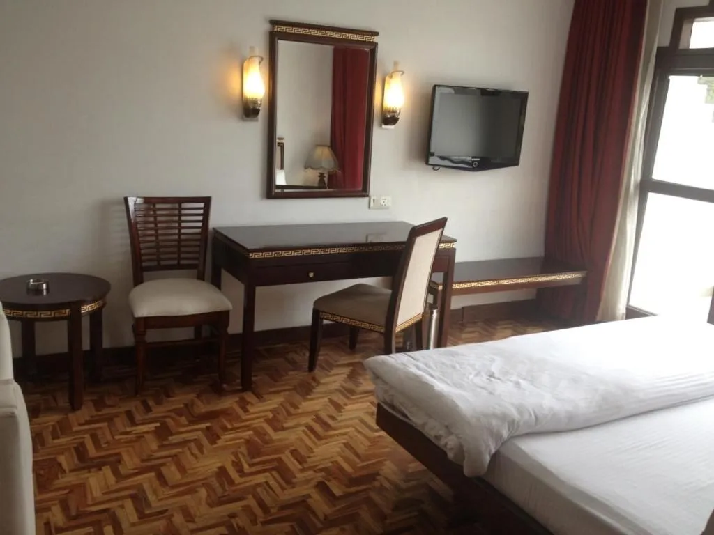 Photo of the whole room, Bed in Mastiff Grand Manali Resort