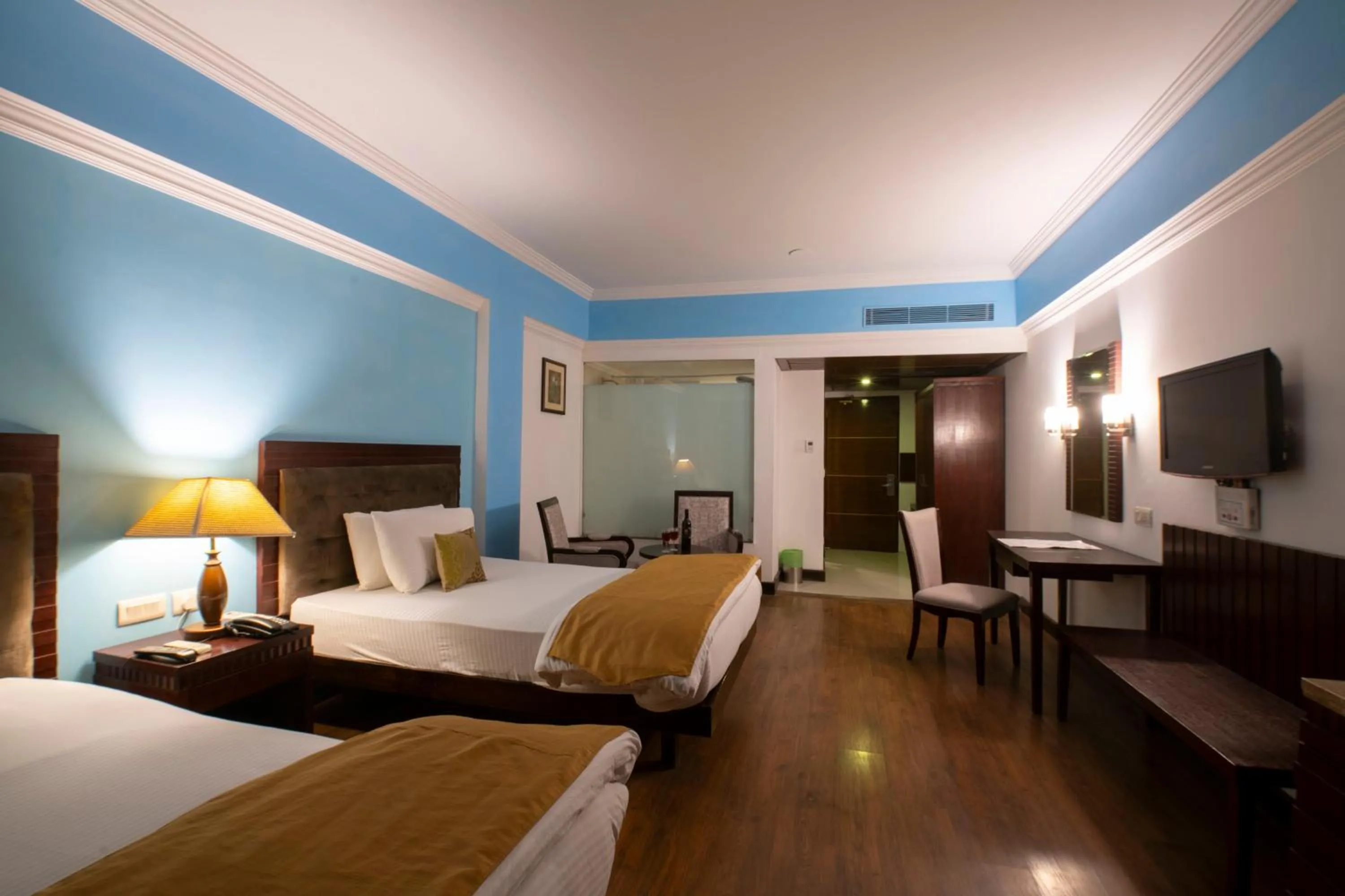 Bed in Mastiff Grand Manali Resort