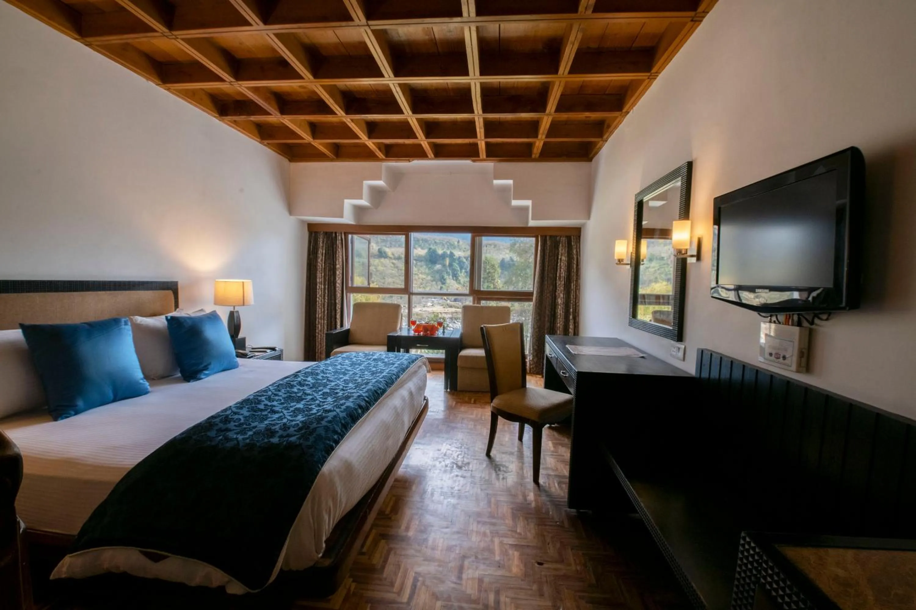 Bed in Mastiff Grand Manali Resort