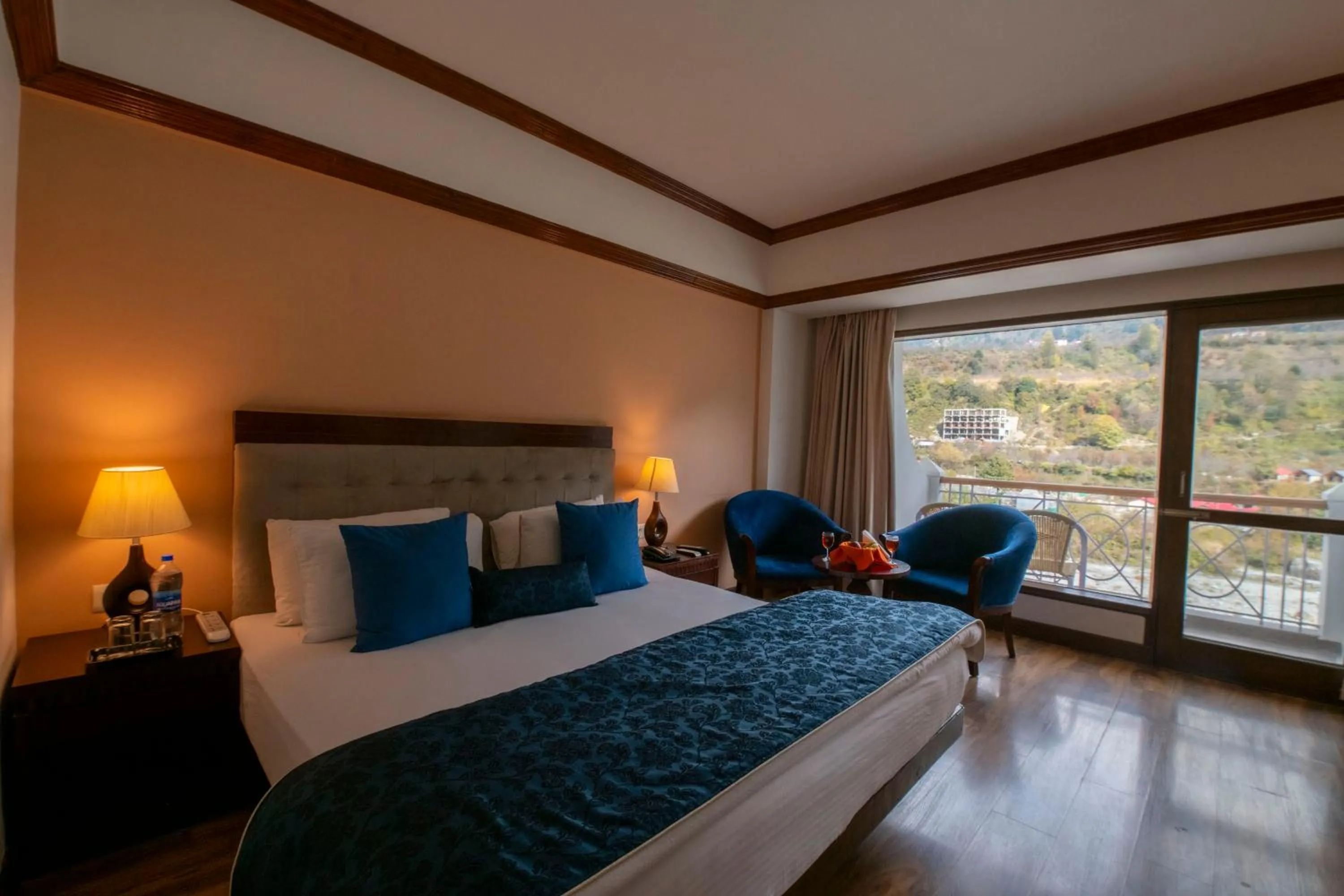 Bed in Mastiff Grand Manali Resort