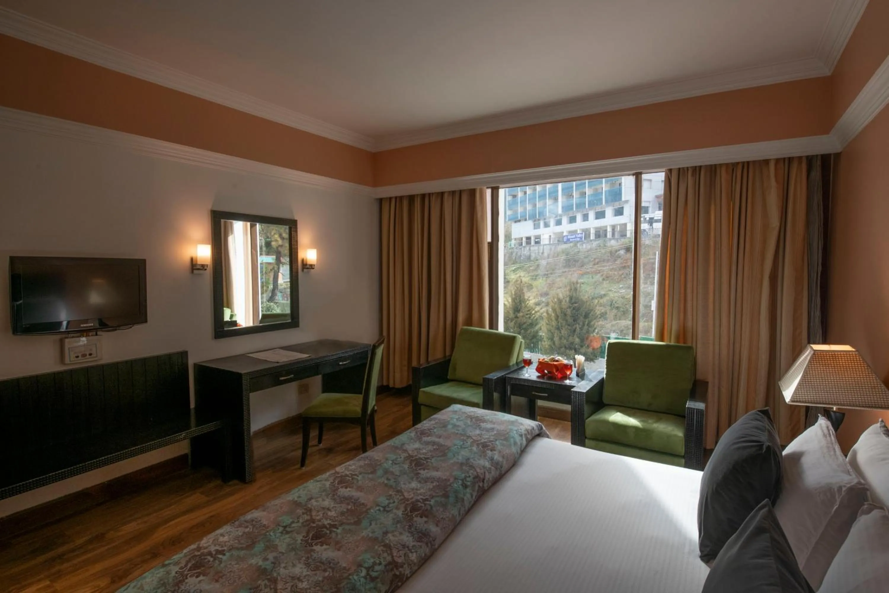 Bed in Mastiff Grand Manali Resort