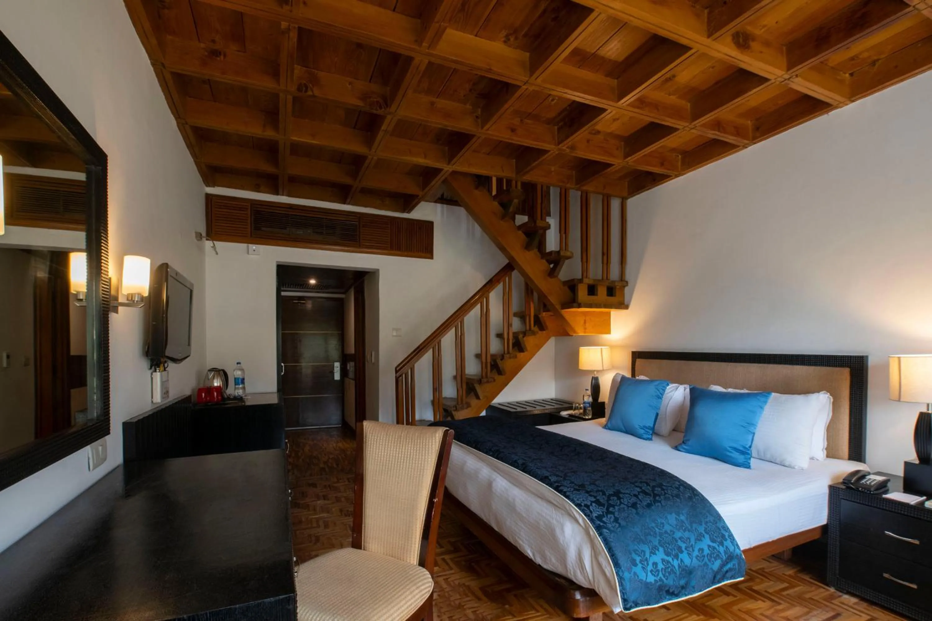 Bed in Mastiff Grand Manali Resort