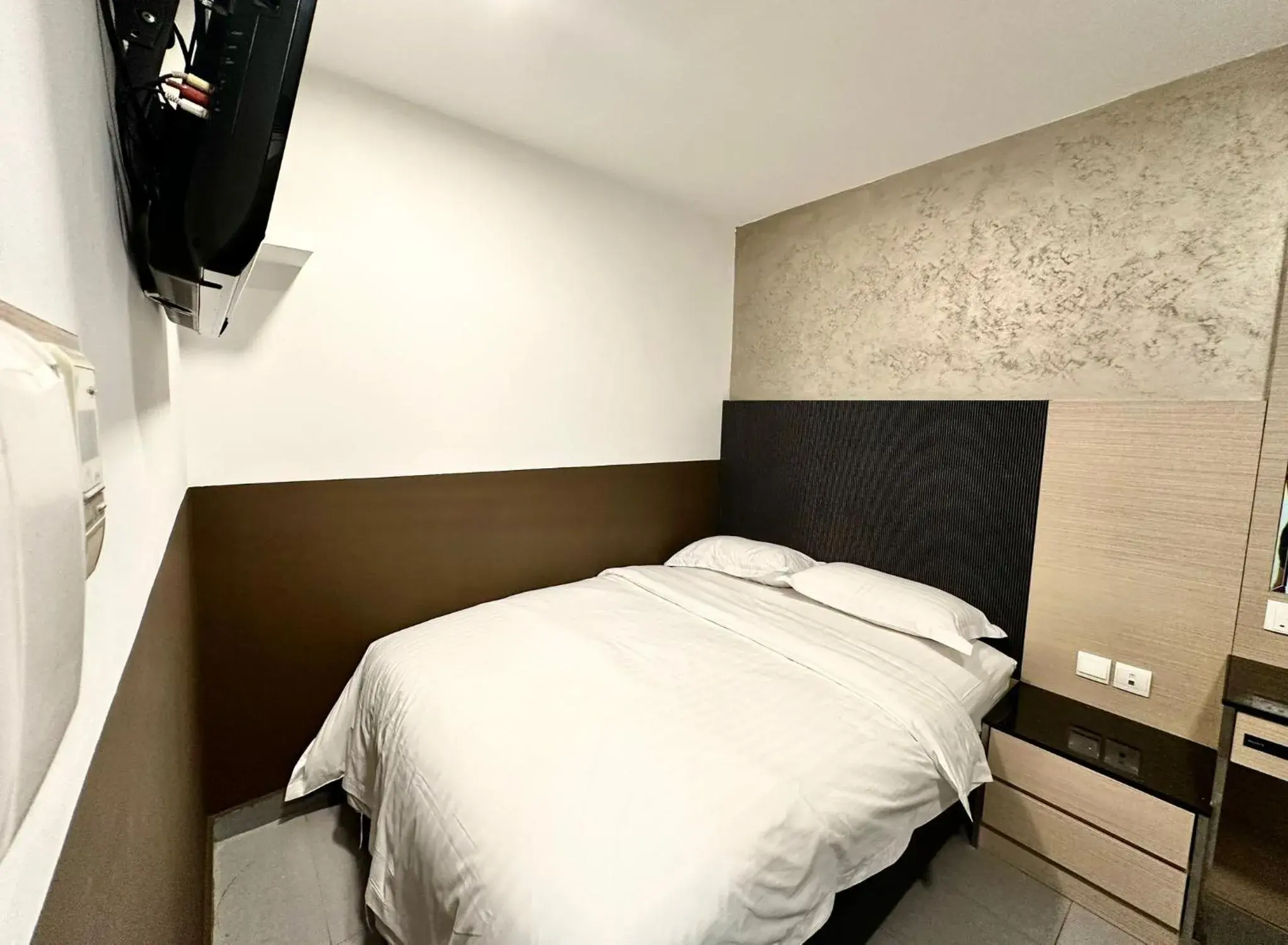 Bed in The Snooze Hotel at Bugis Bed in The Snooze Hotel at Bugis