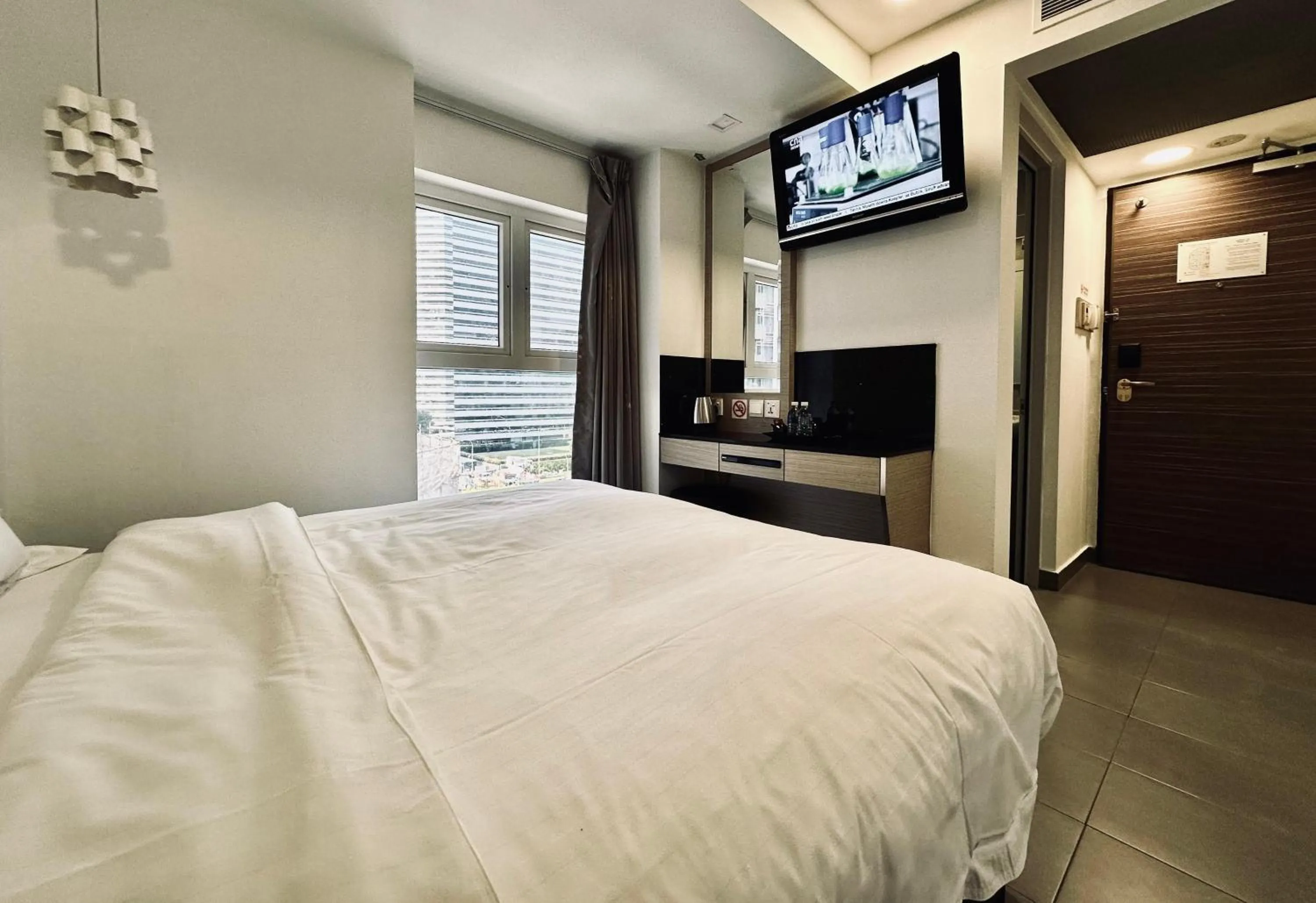 View (from property/room), Bed in The Snooze Hotel at Bugis