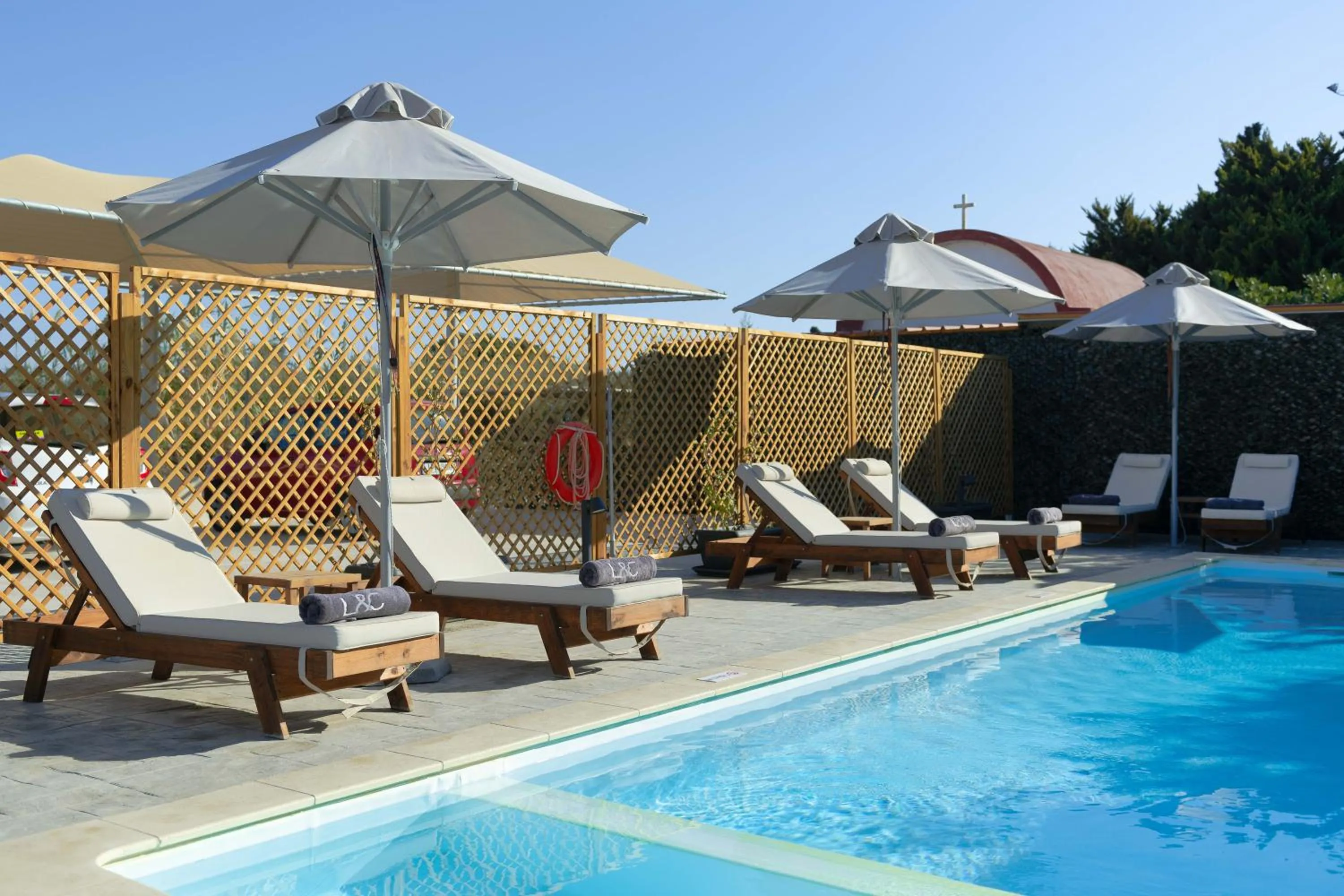 Swimming pool in L & C Boutique Apartments