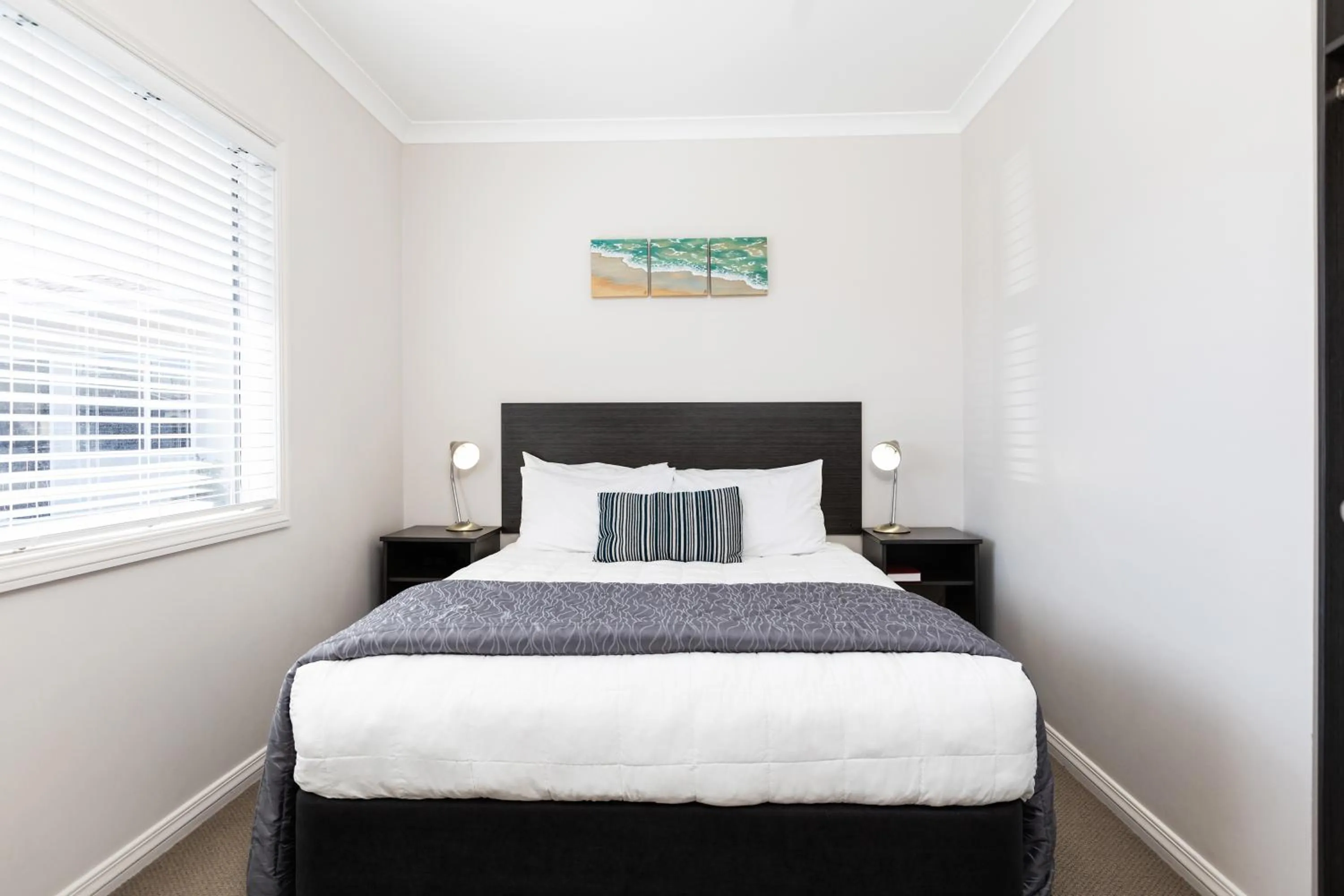 Bed in Beach Street Motel Apartments