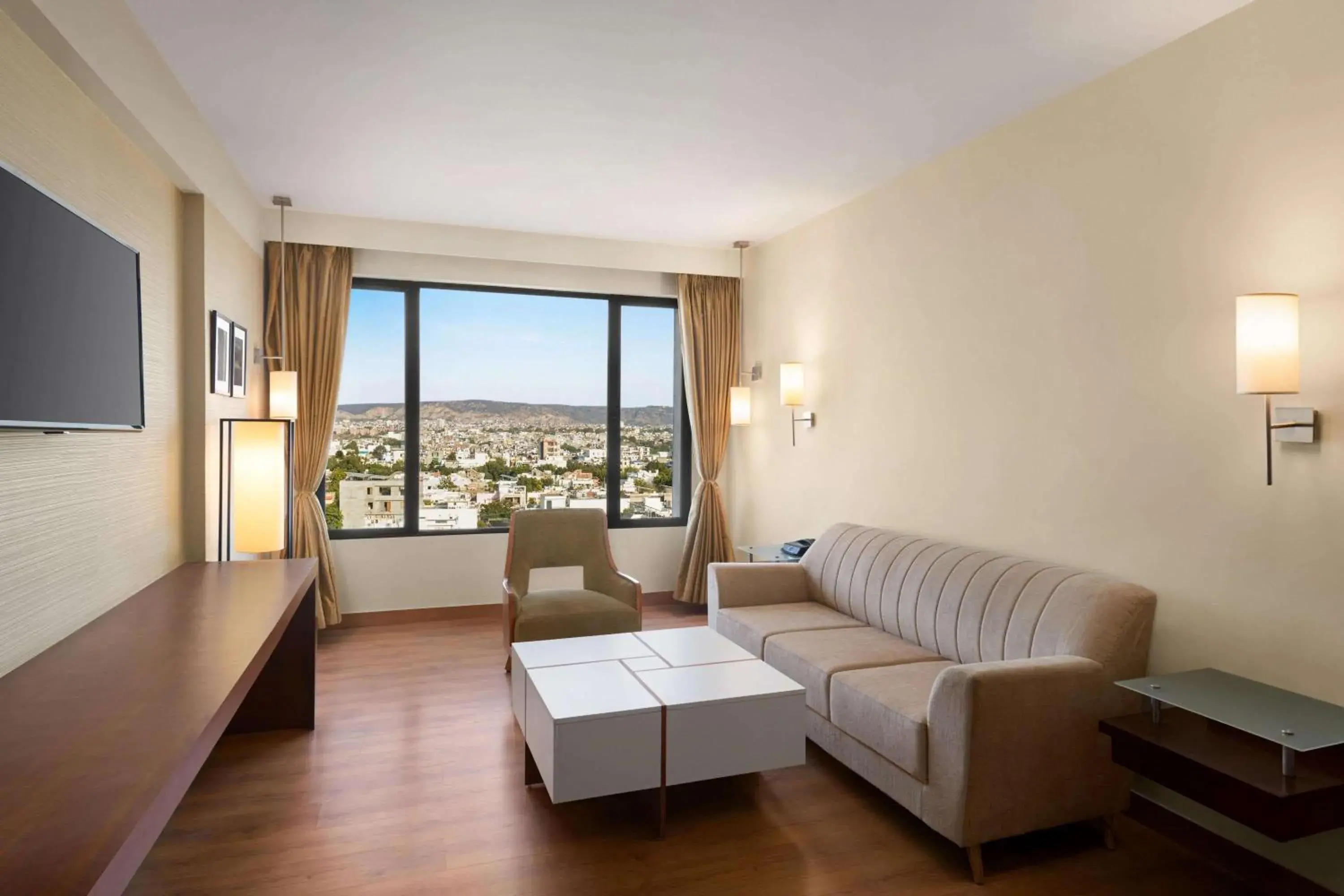 Living room in Ramada by Wyndham Jaipur North Living room in Ramada by Wyndham Jaipur North