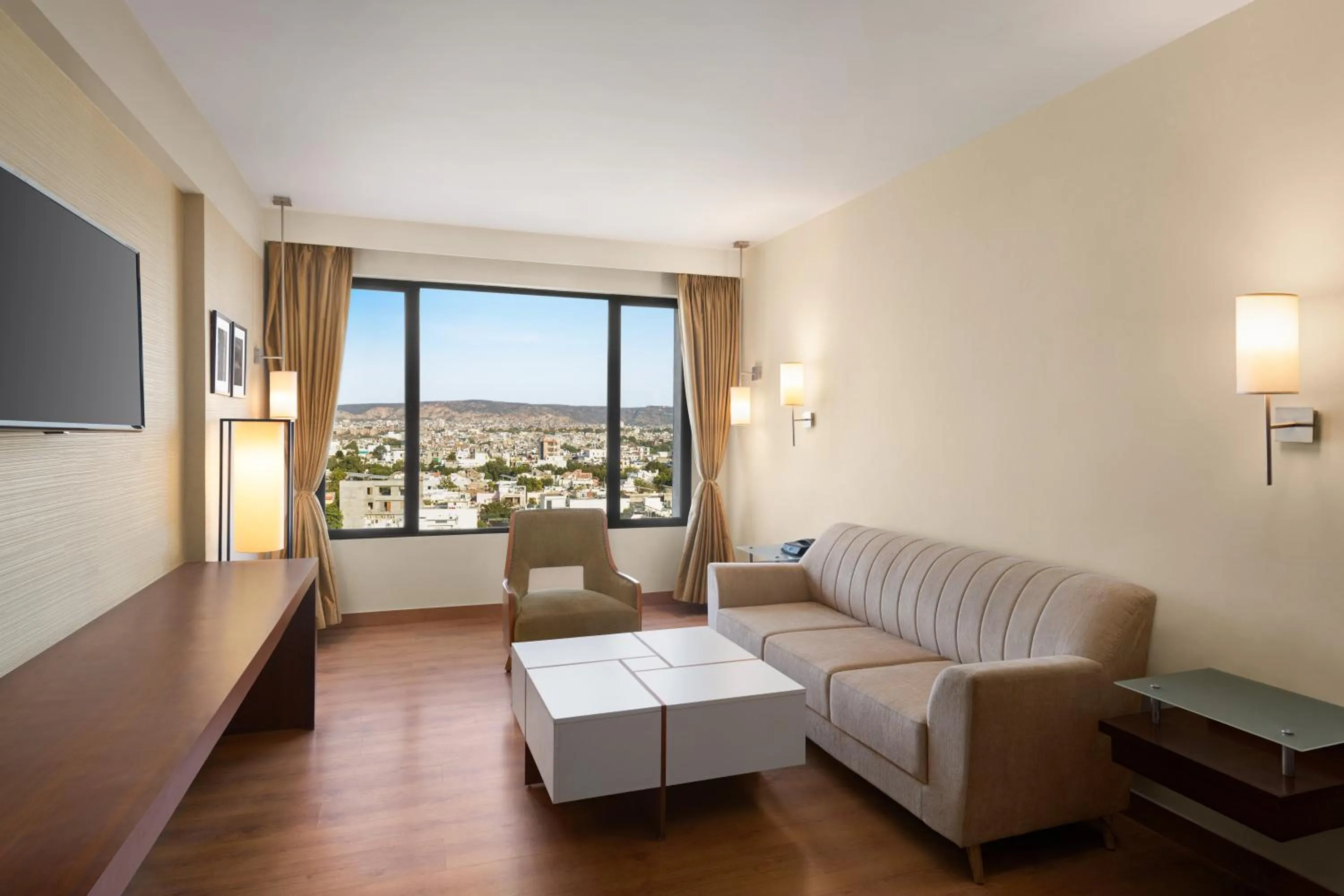 Living room in Ramada by Wyndham Jaipur North