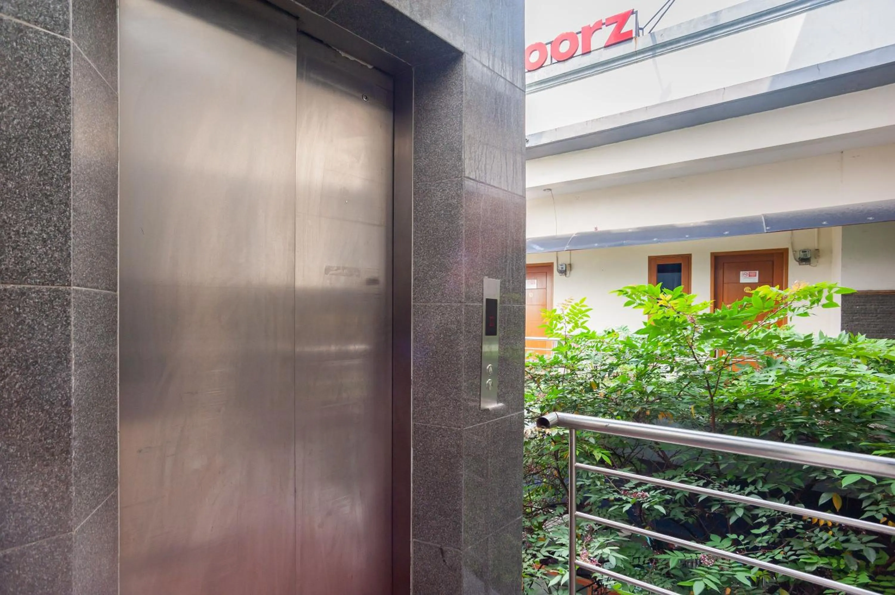elevator in RedDoorz Plus near Universitas Indonesia