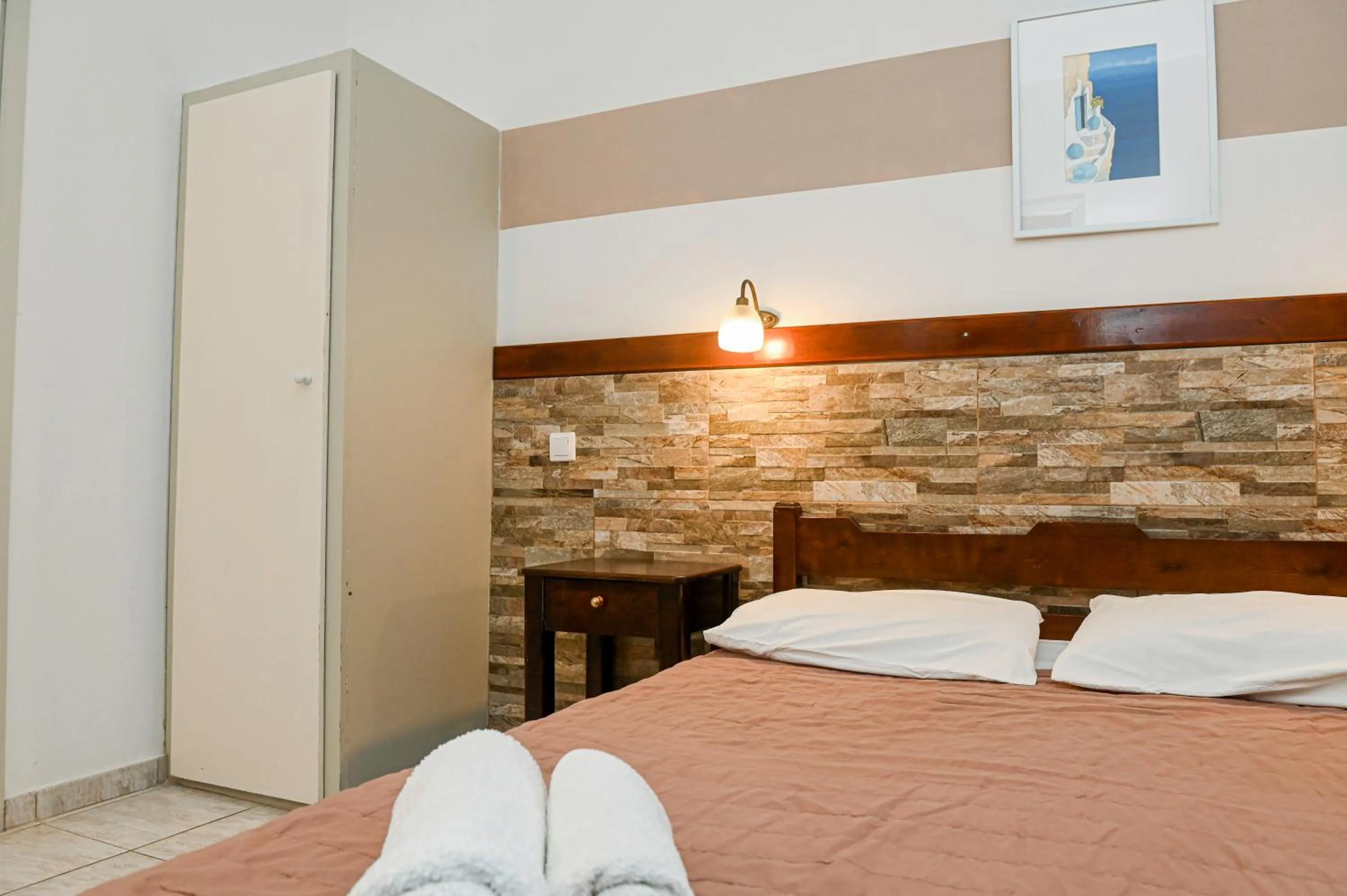 Bed in Narkissos Hotel