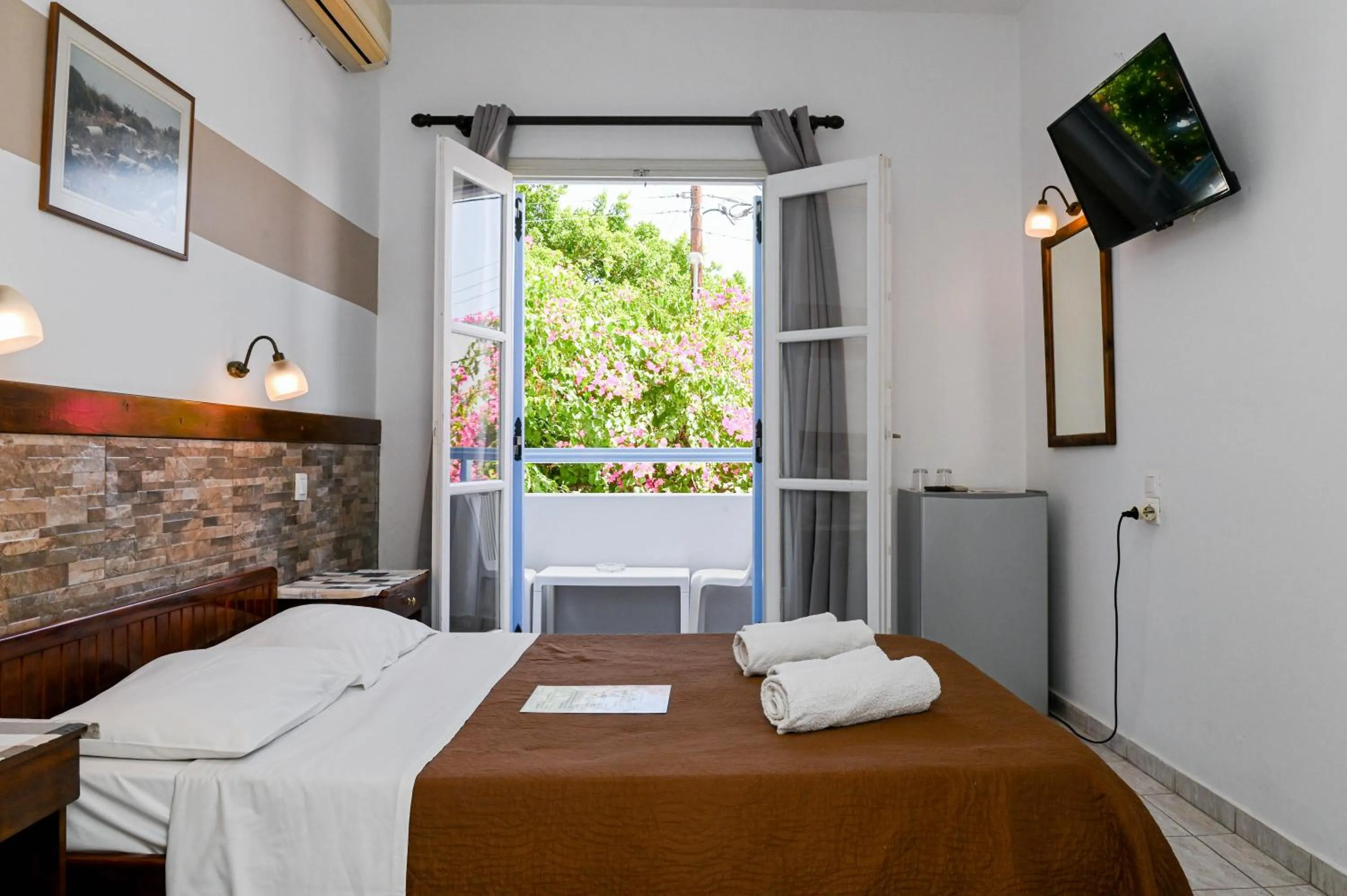 Bed in Narkissos Hotel