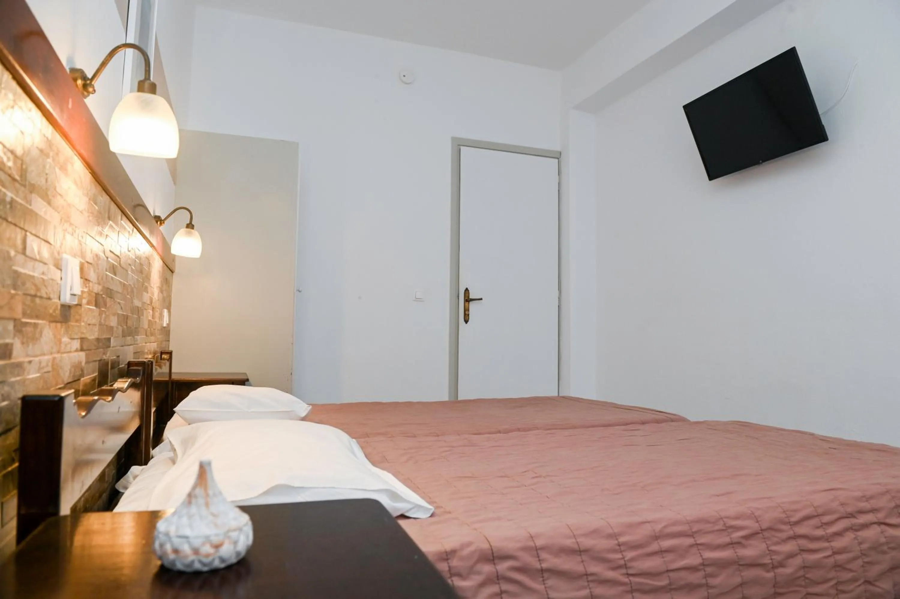 Bed in Narkissos Hotel