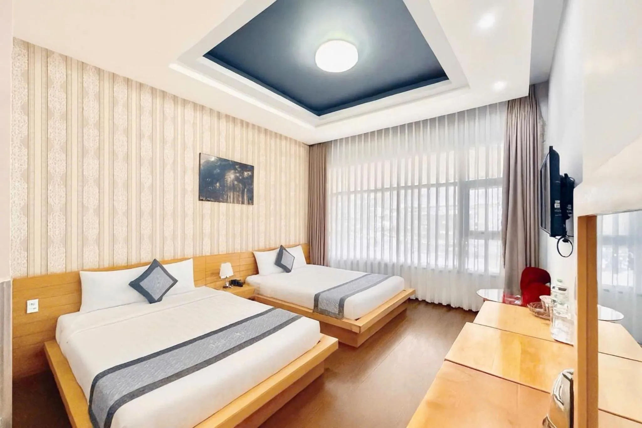 Photo of the whole room, Bed in Dalat Wind Hotel