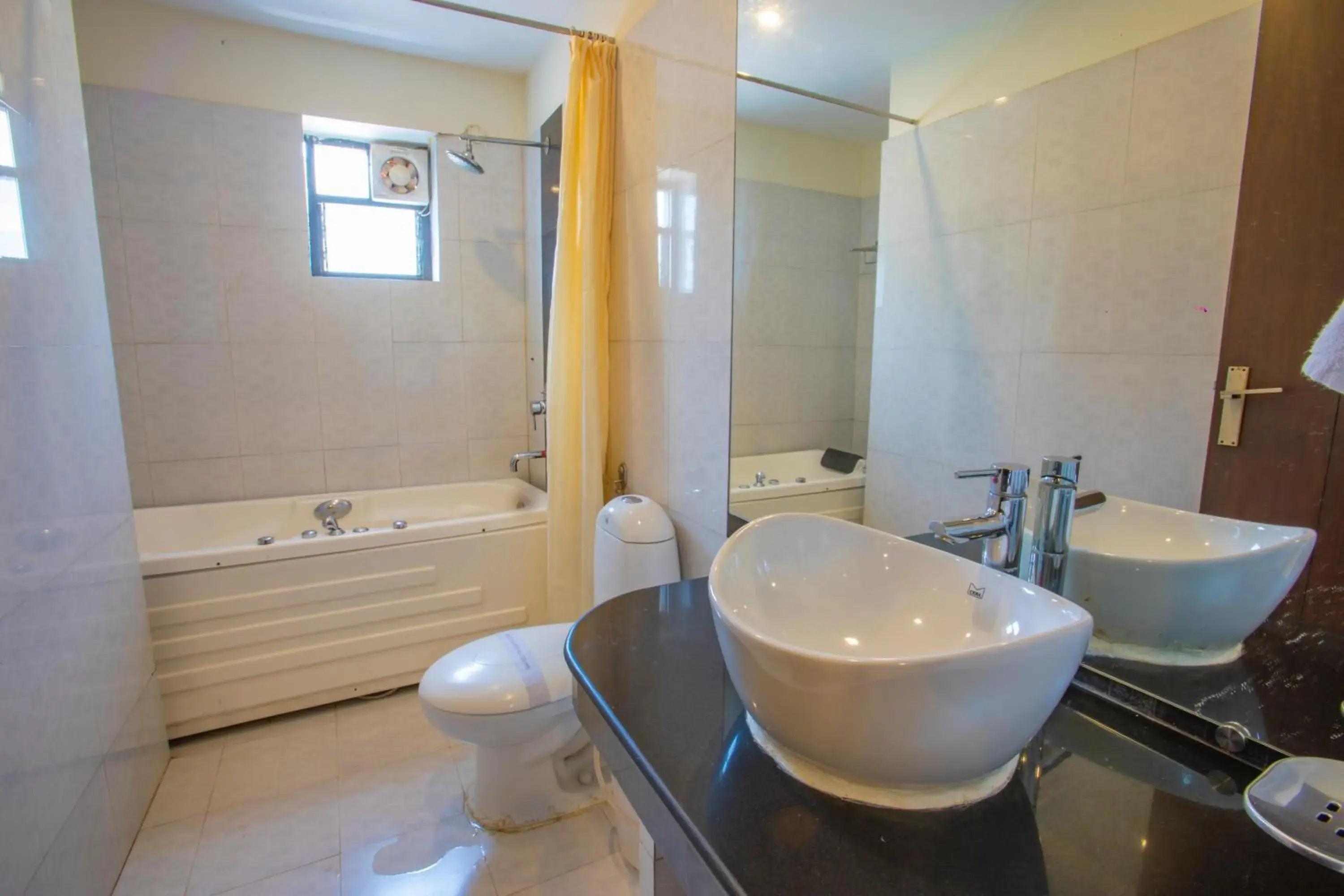 Bathroom in Nitya Resort, Calangute Bathroom in Nitya Resort, Calangute